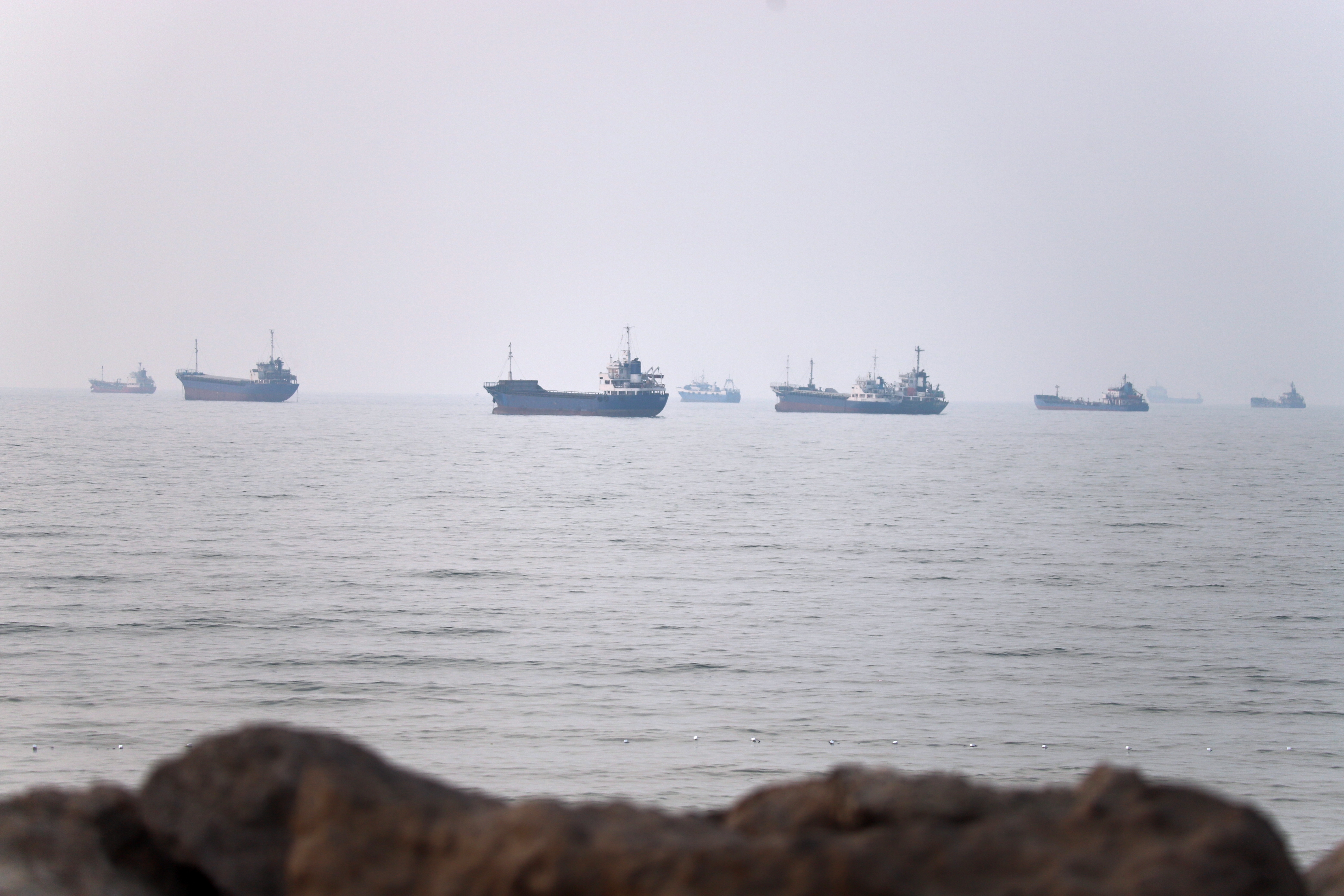 Commercial vessels are seen in the Strait of Hormuz off Bandar Abbas, Iran, Tuesday, June 30, 2026. 