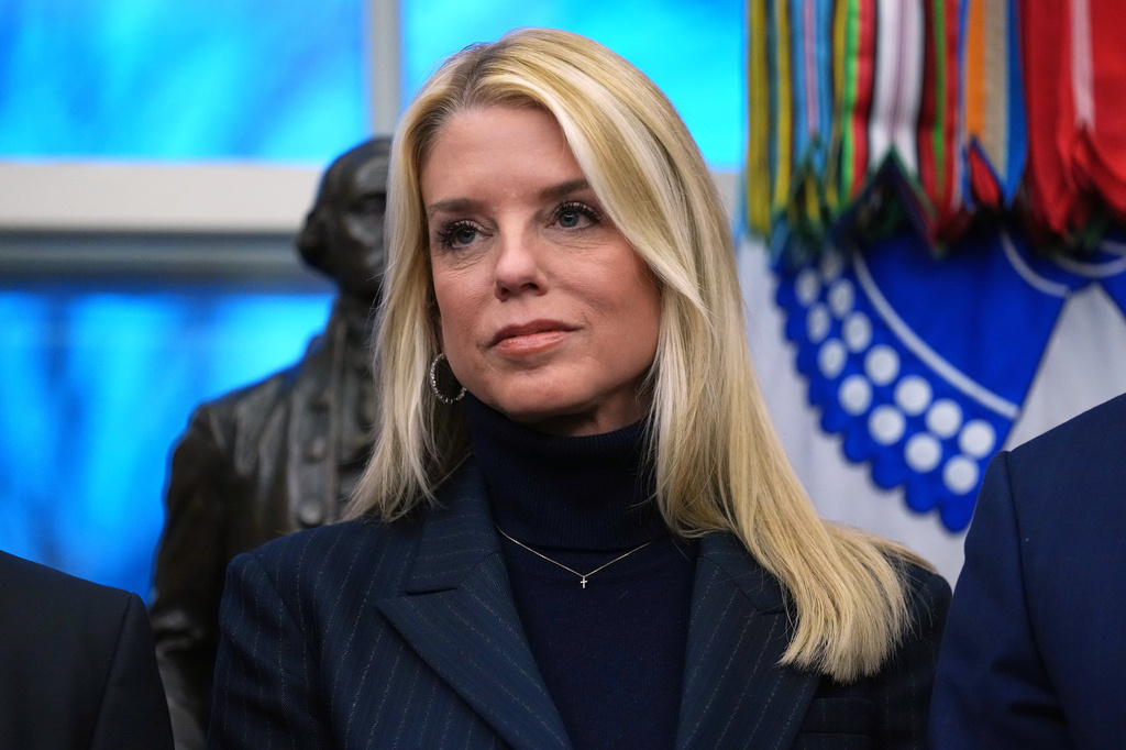 Attorney General Pam Bondi listens as President Donald Trump speaks at an event on addiction recovery in the Oval Office of the White House, Jan. 29, 2026, in Washington.