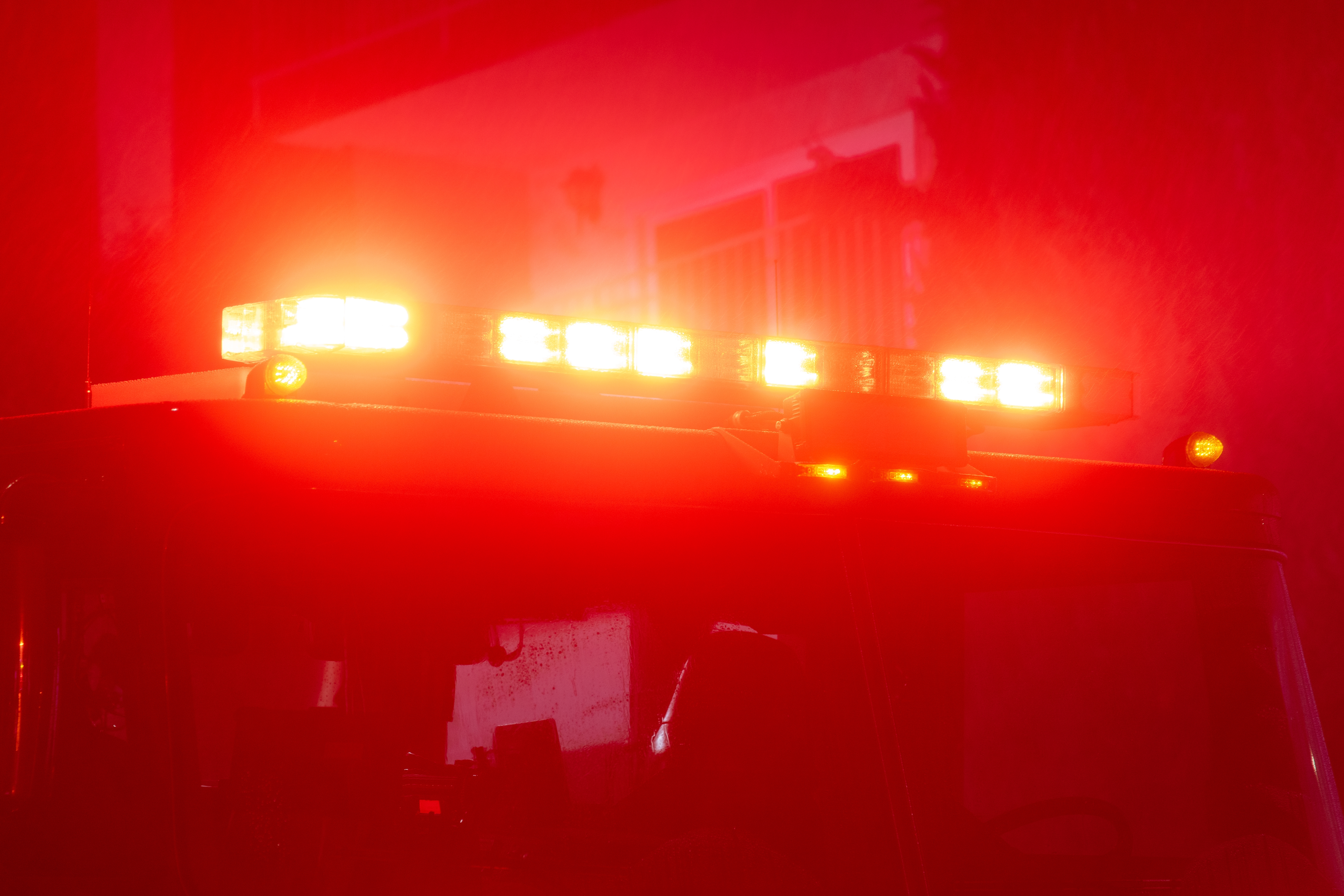 Flashing lights on a fire truck.