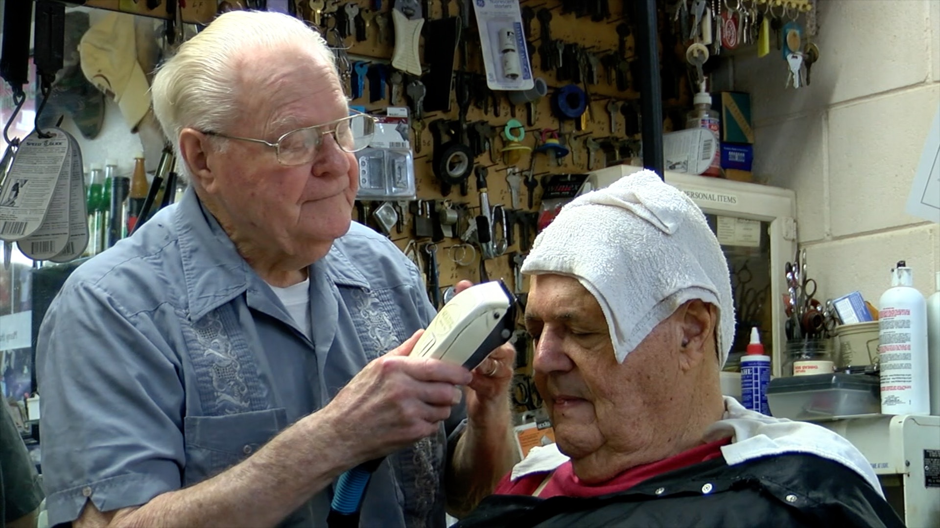 Mr. Taylor in the middle of a haircut