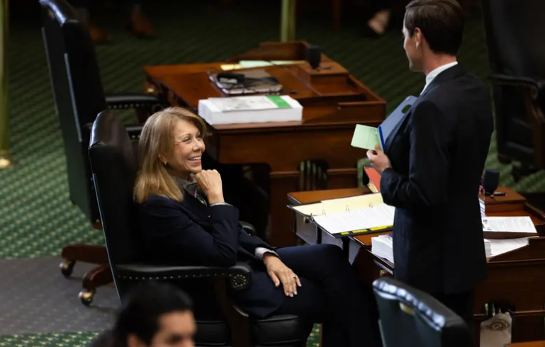 Senator Joan Huffman, R-Houston, speaks with Senator Mayes Middleton, R-Galveston, during a Texas Senate meeting on Budget Day, March 25, 2025..