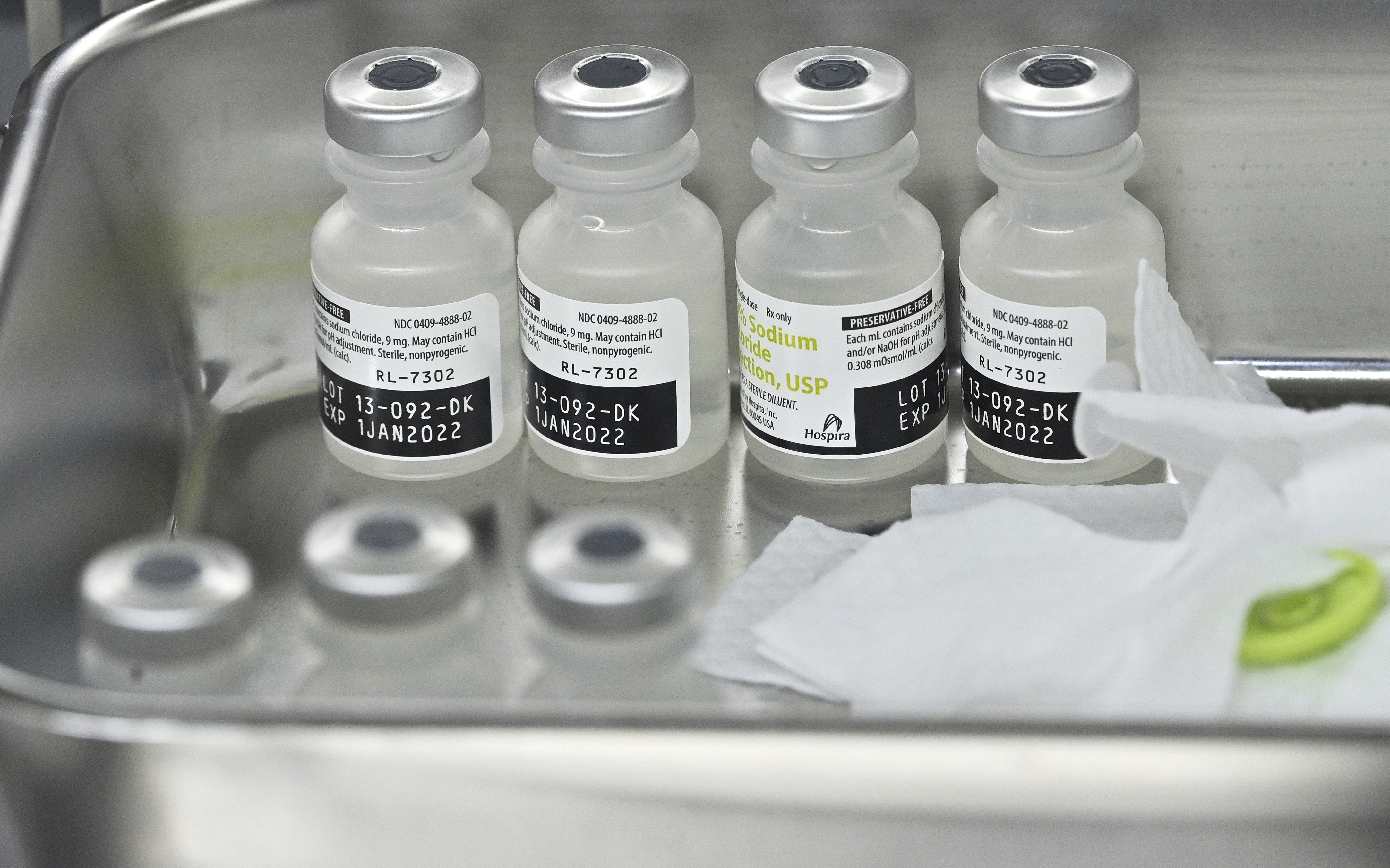 vials of Pfizer COVID-19 vaccine prepare to be administered in South Korea, March 20, 2021