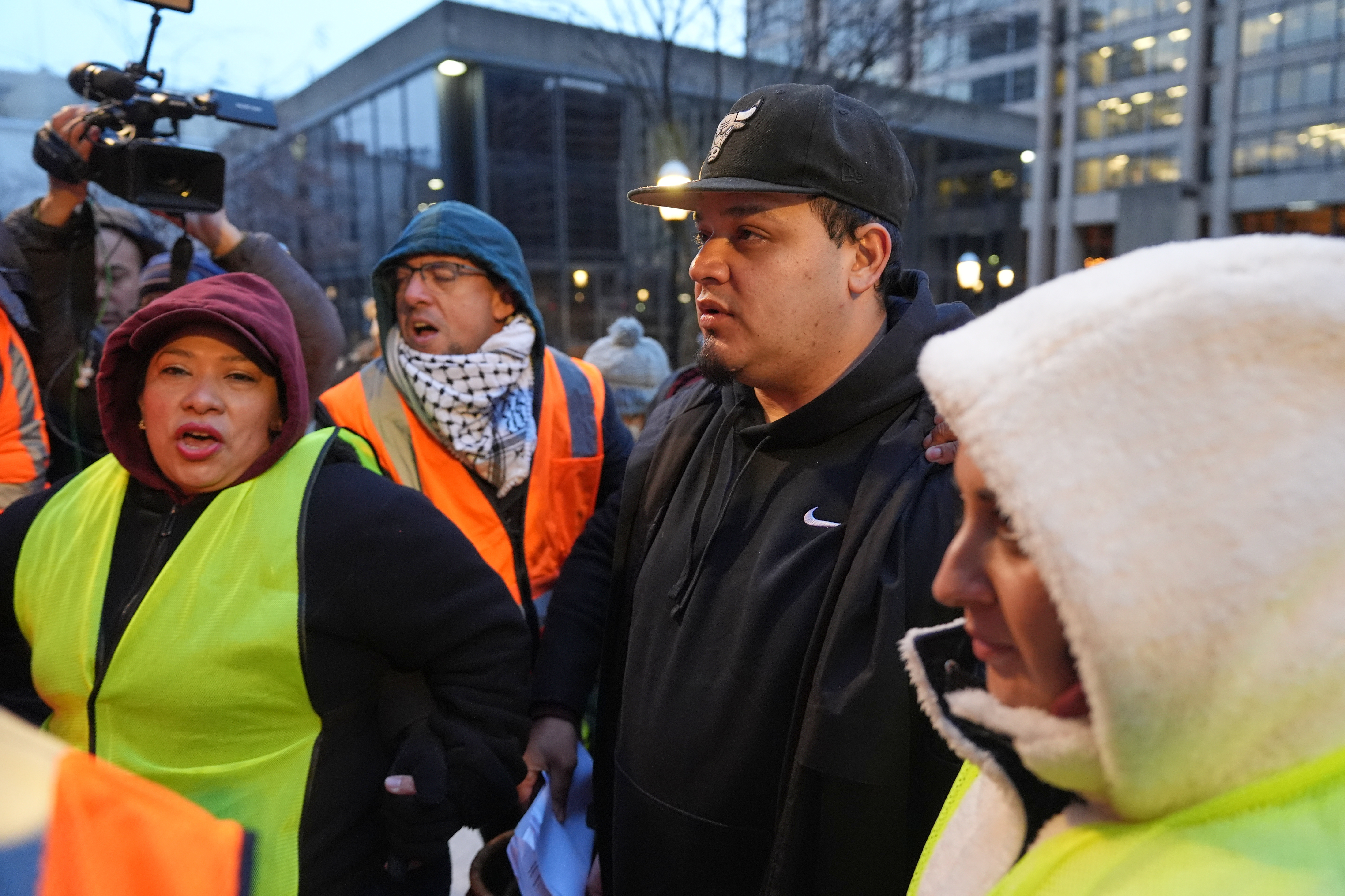 Kilmar Abrego Garcia waits to enter the building for a mandatory check at the Immigration and Customs Enforcement office in Baltimore, Friday, Dec. 12, 2025, after he was released from detention on Thursday under a judge's order. 