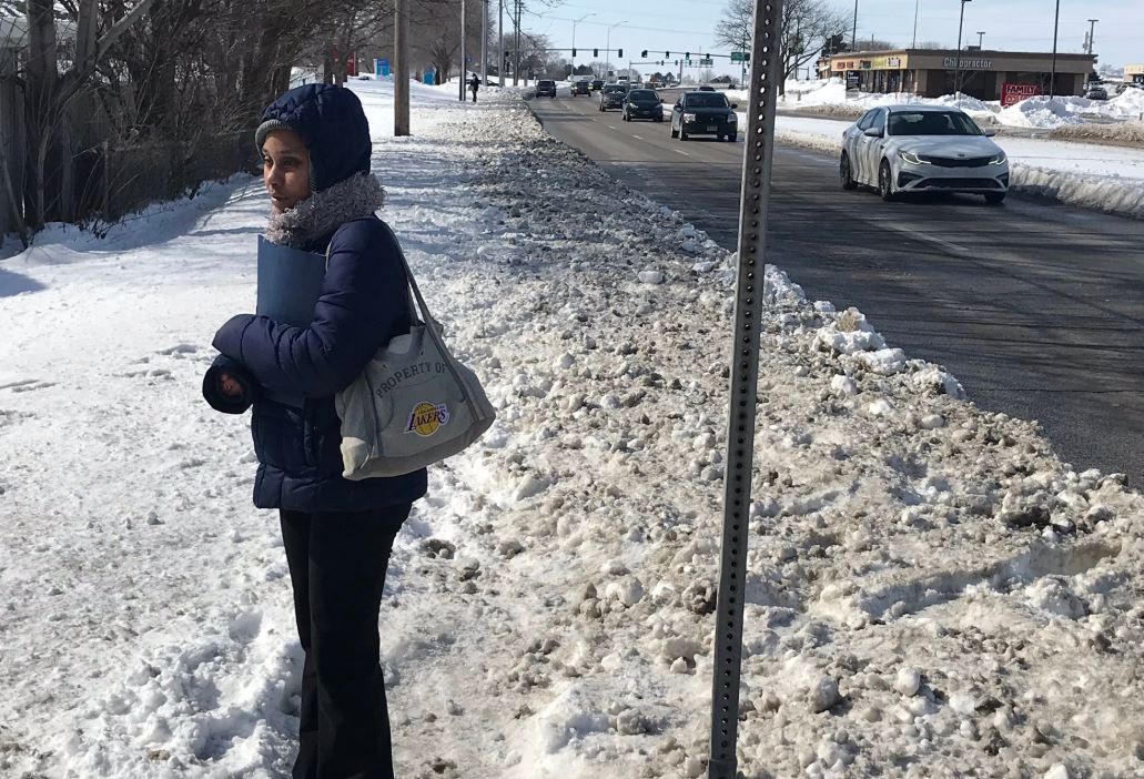 snow on sidewalk omaha bus stop