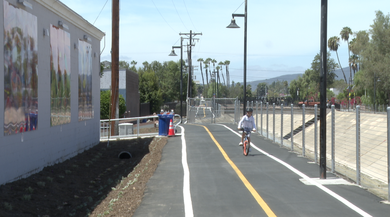 A young biker enjoys the Escondido Creek Trail on Saturday afternoon. 