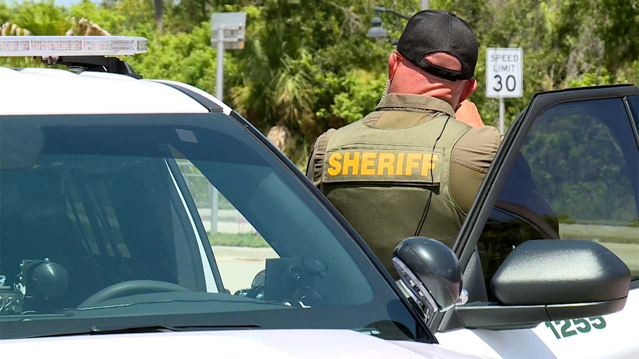 A St. Lucie County deputy clocks drivers' speed on July 16, 2026.