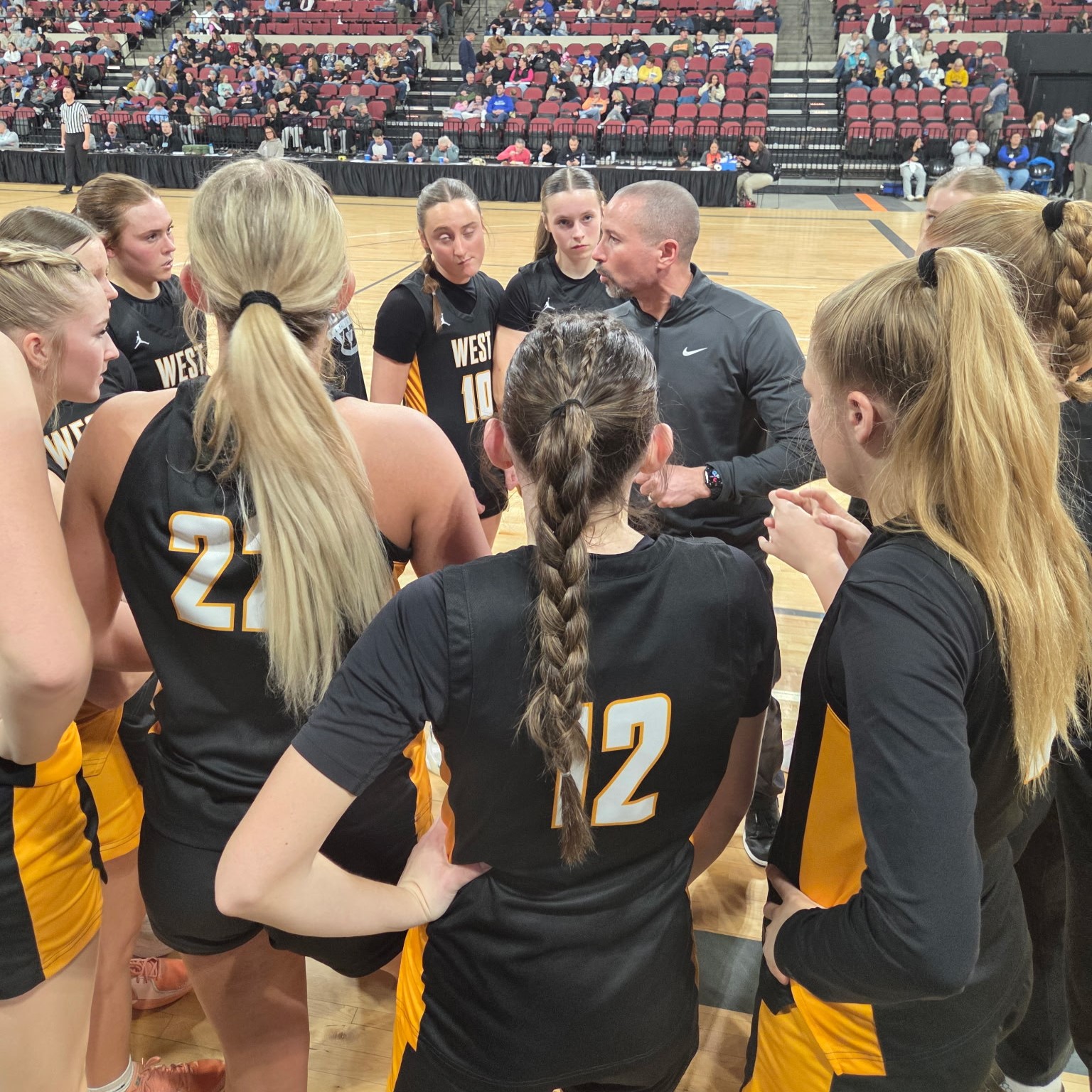 Billings West girls basketball huddle