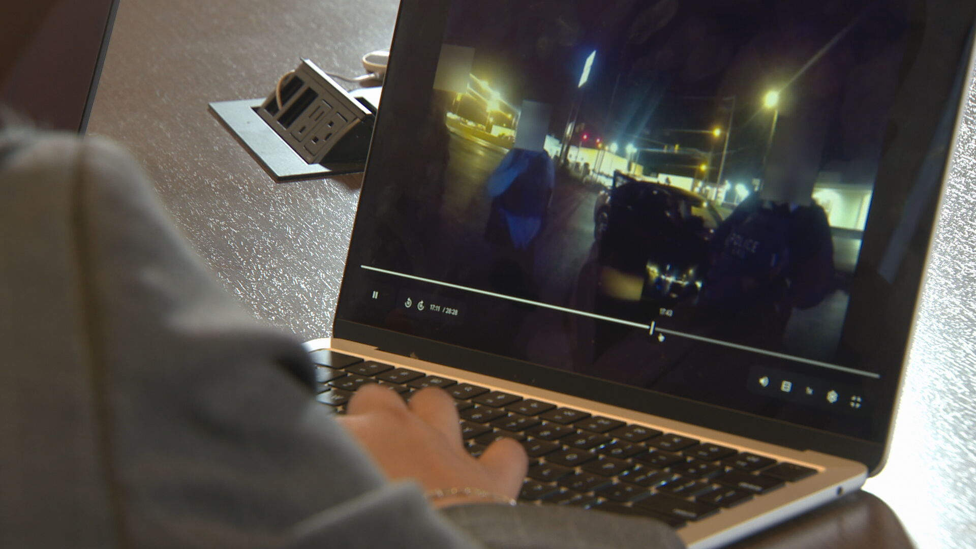 Araceli Crescencio watches body camera footage.jpeg