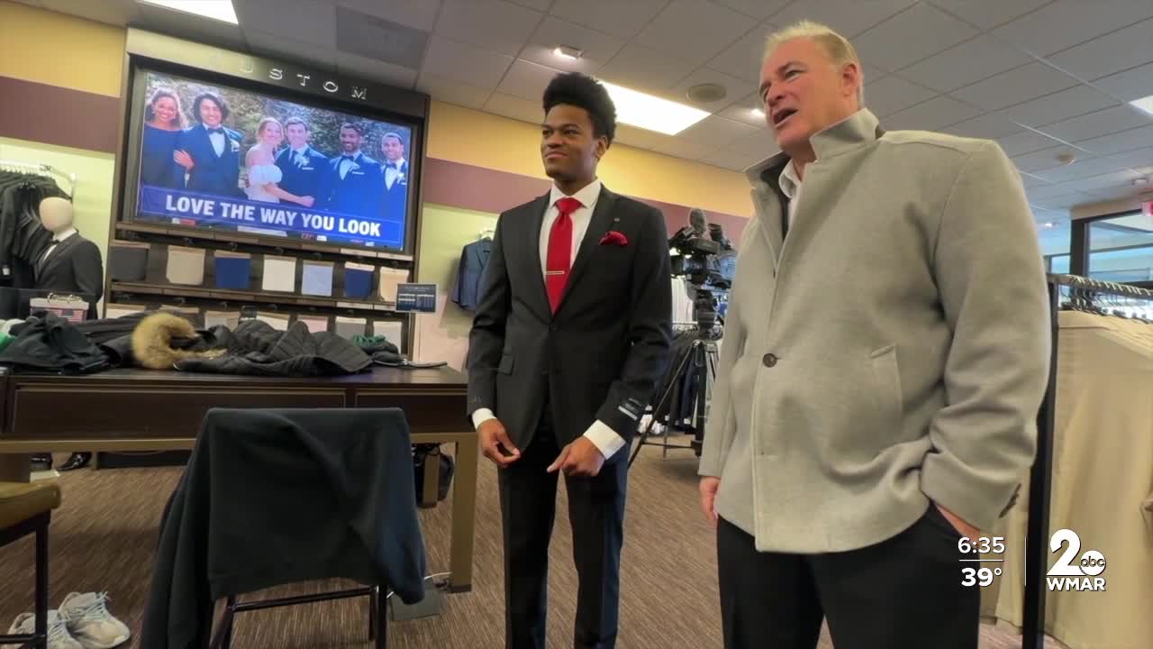 Cancer survivor gifts suits to college football team