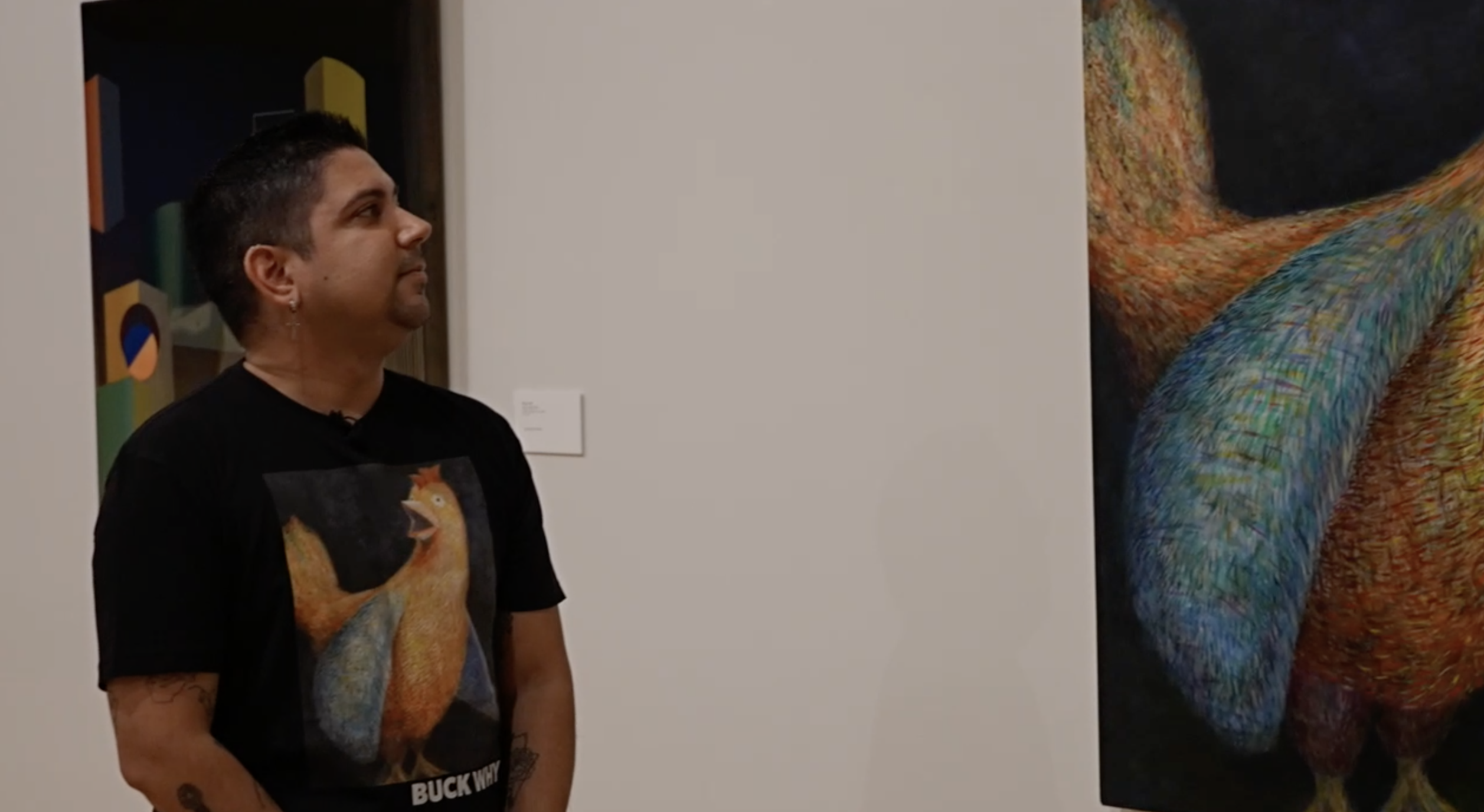 Buck Why painting with a Buck Why shirt.