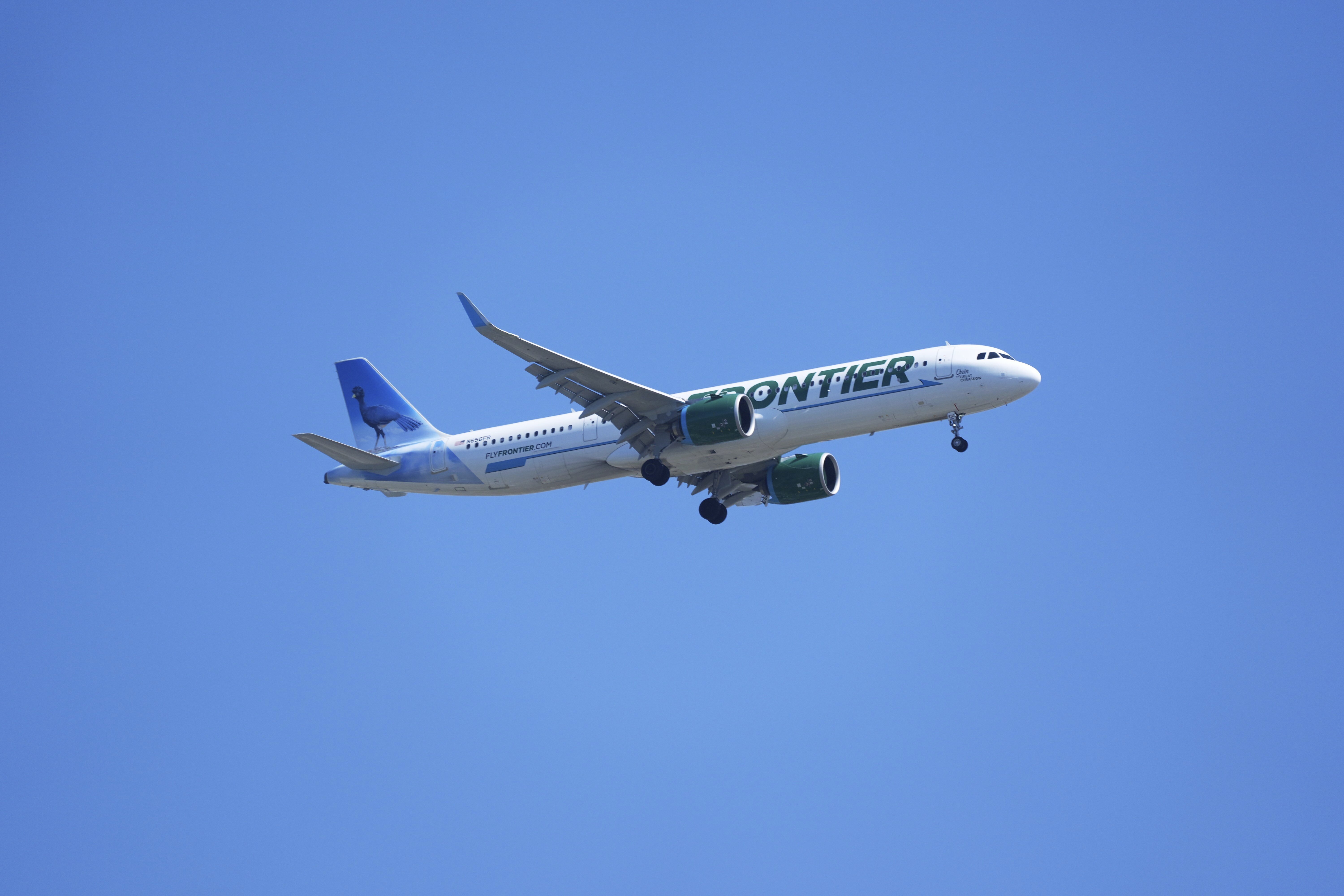 A Frontier Airlines plane lands at Sarasota-Bradenton International Airport Friday, March 28, 2025. 