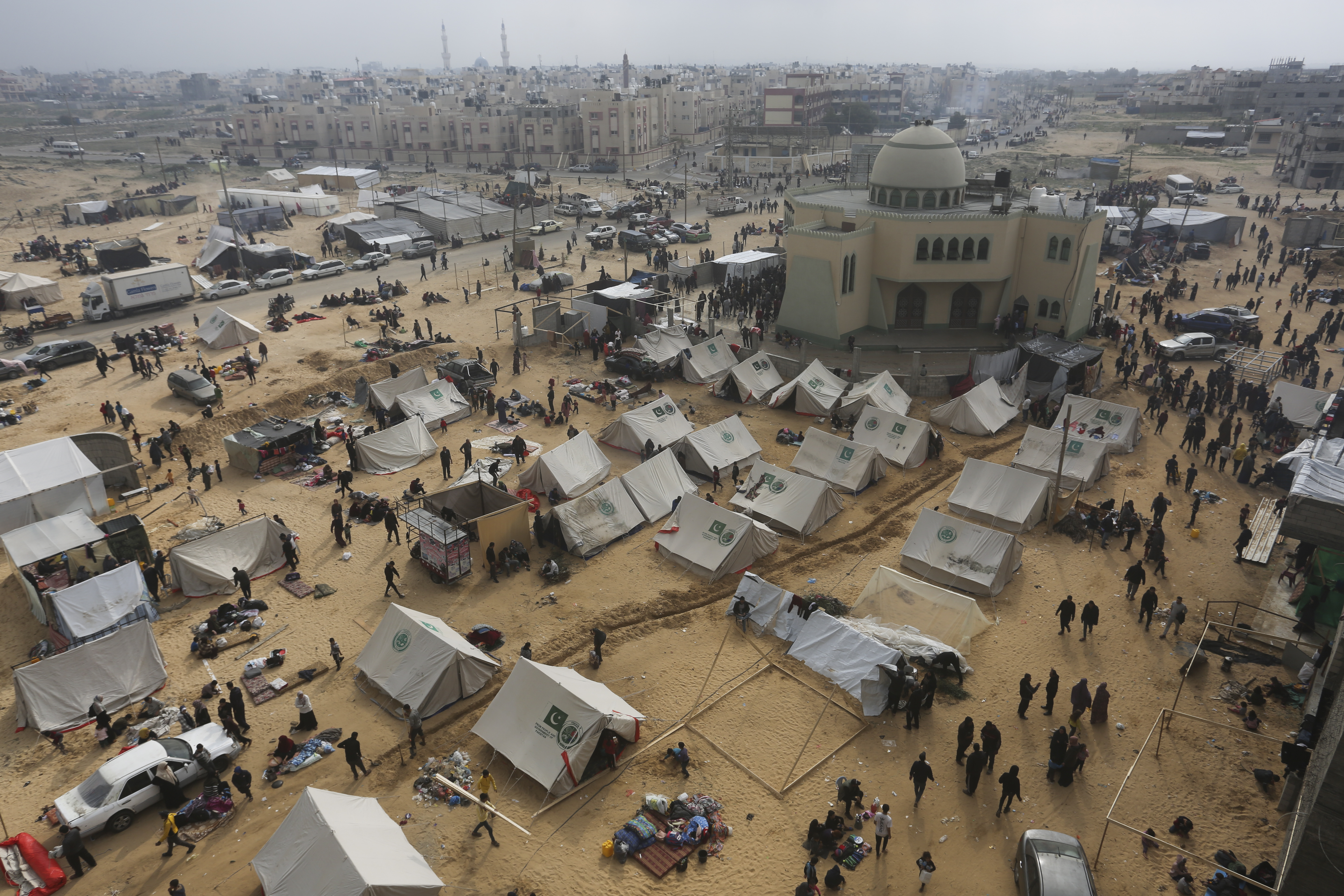 Palestinians fleeing the Israeli ground offensive arrive in Rafah, Gaza Strip, Tuesday, Dec. 5, 2023. (AP Photo/Hatem Ali)