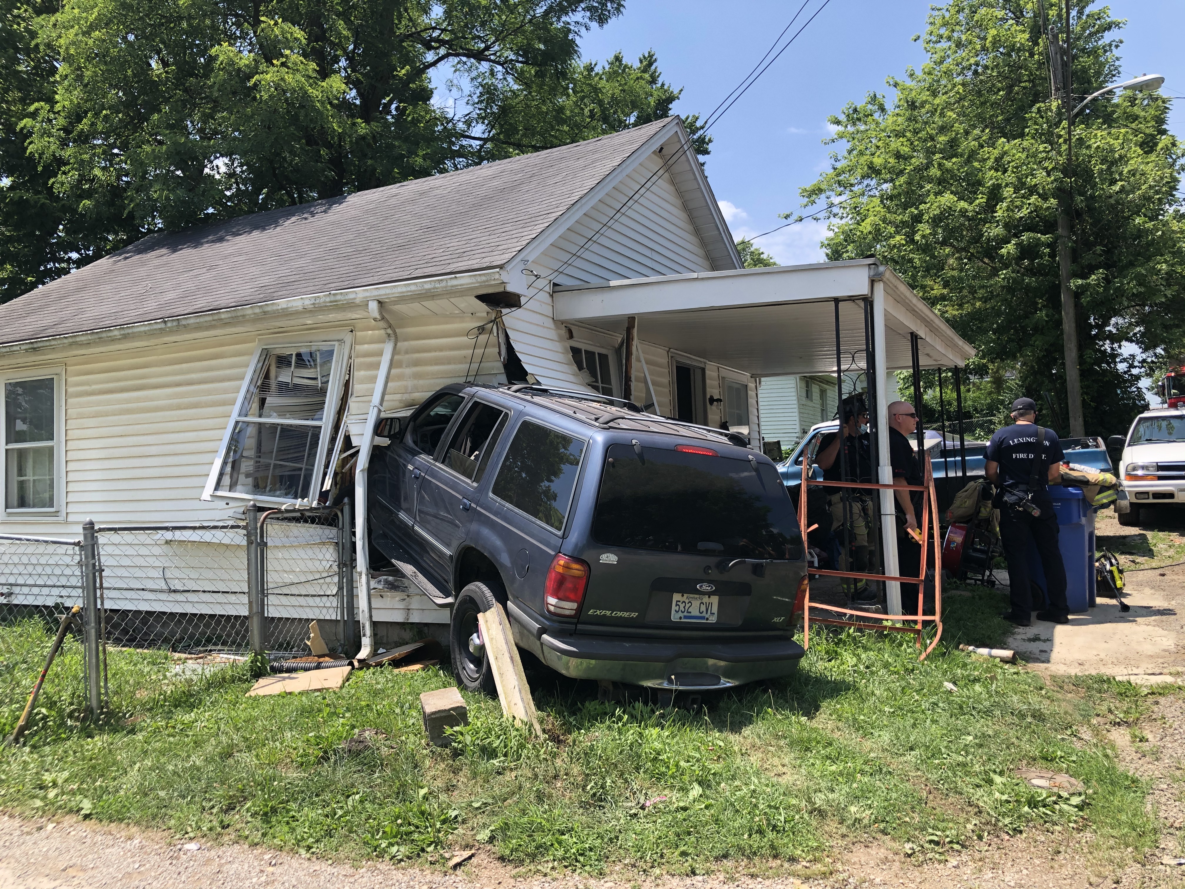 Car crashes into house in Lexington