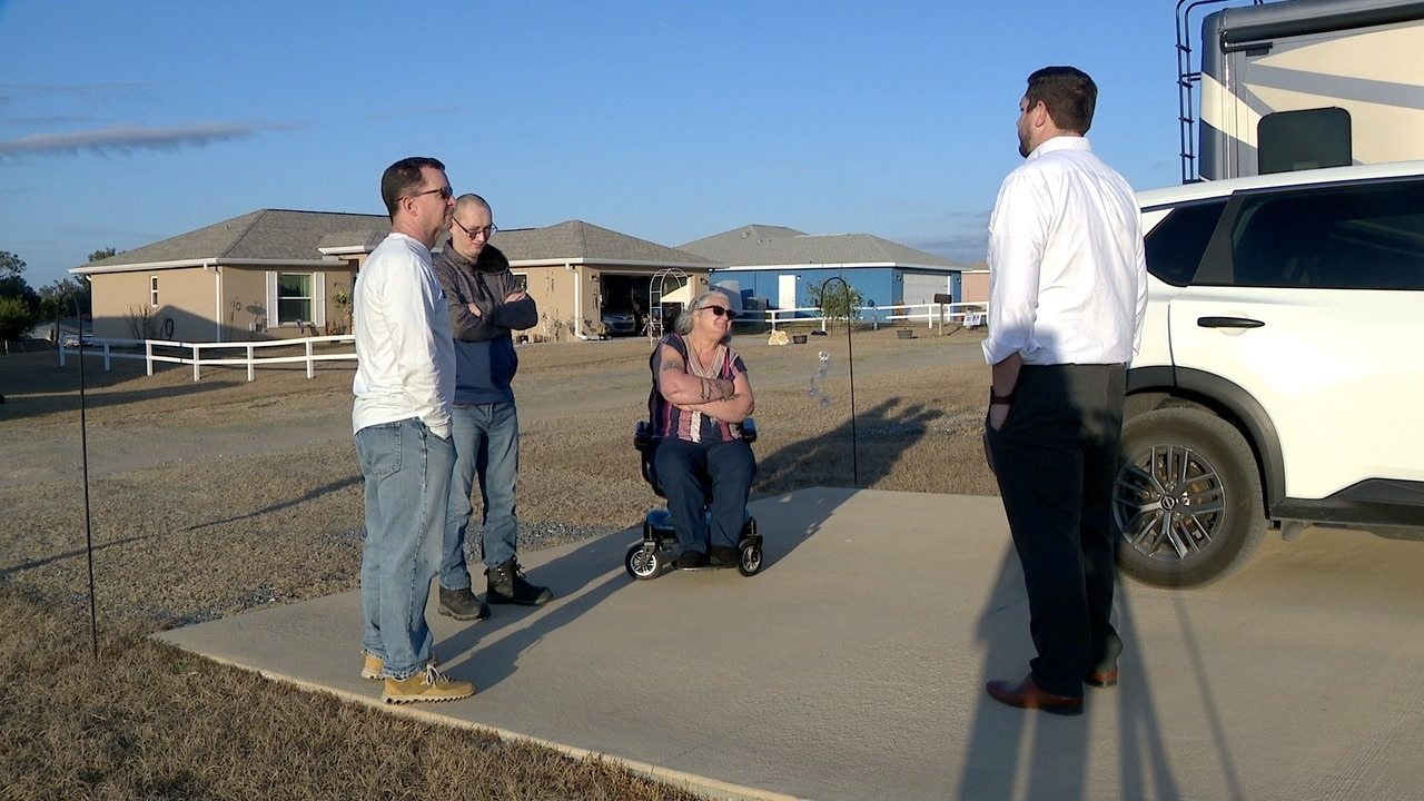 Homeowners hope lawsuit's settlement will bring relief to sandy, unfinished neighborhood