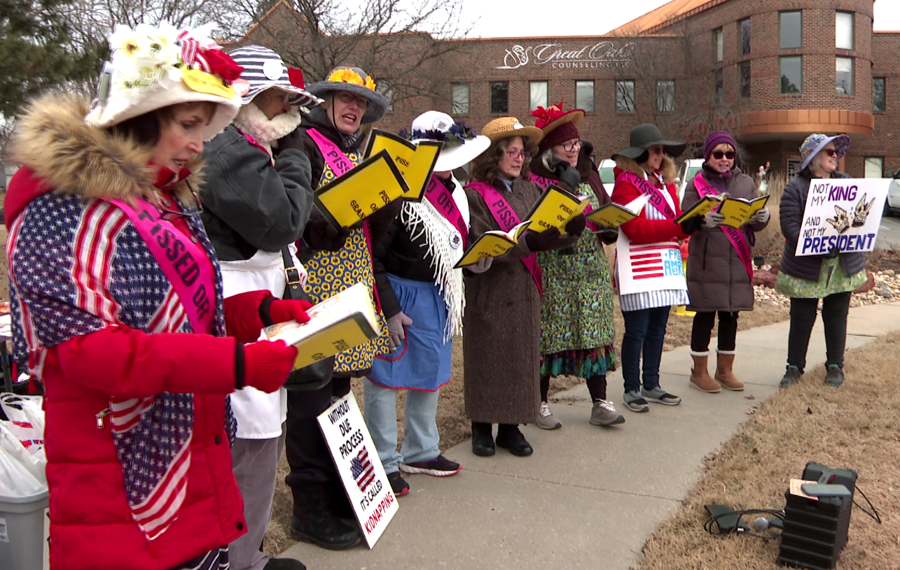 The group, Pissed Off Grannies, sings outside Rep. Don Bacon's office on Jan. 20.