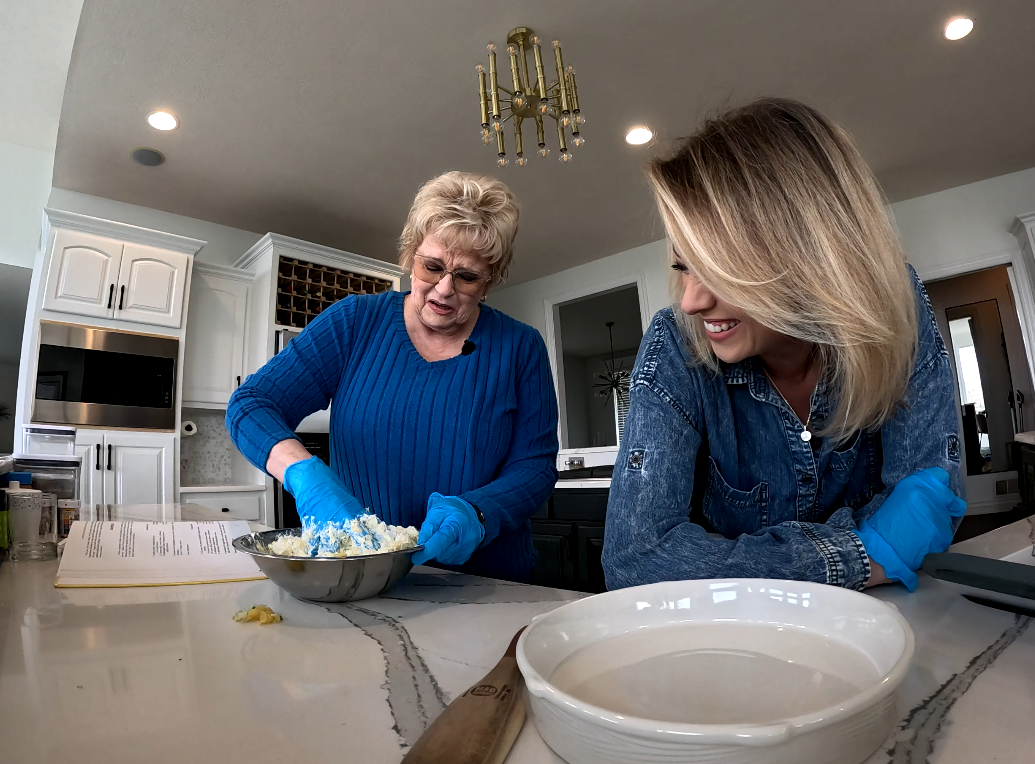 Mary Nelson and her mom, Ruth, make Memaw's pineapple, green pepper and onion cheese ball recipe.