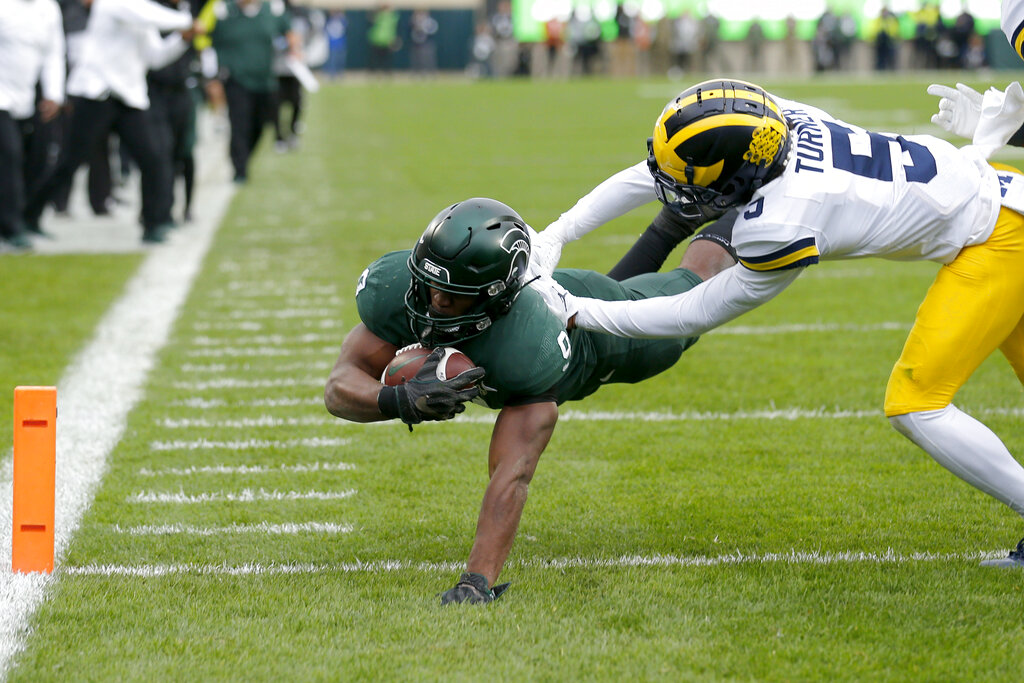 Kenneth Walker III, DJ Turner