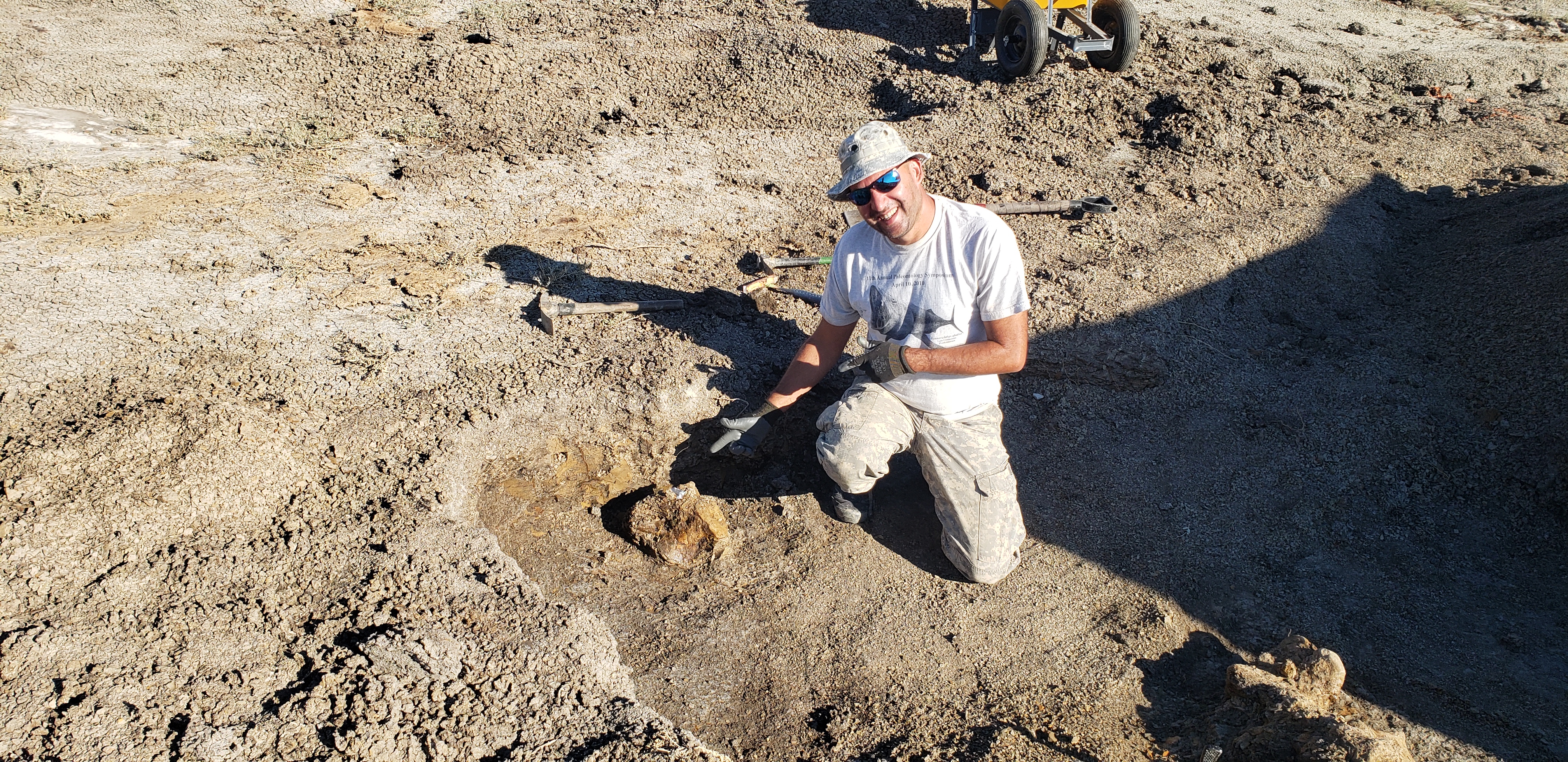 Curator Anthony showing off a bone.jpg