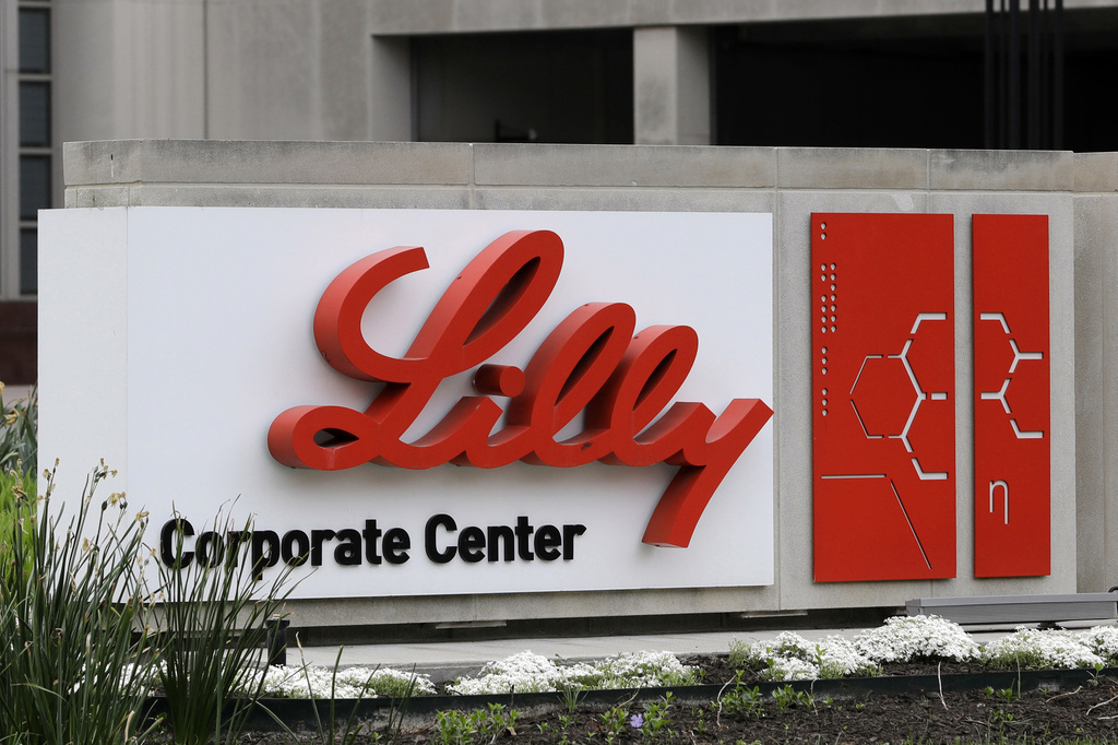 FILE - A sign for Eli Lilly & Co. sits outside their corporate headquarters in Indianapolis.