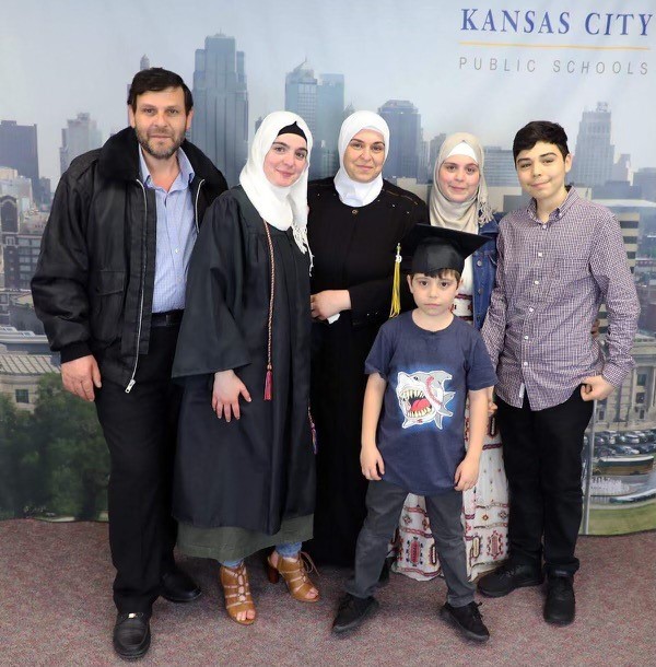 Huda and family after KCPS Middle College graduation at MCC Penn Valley.jpg