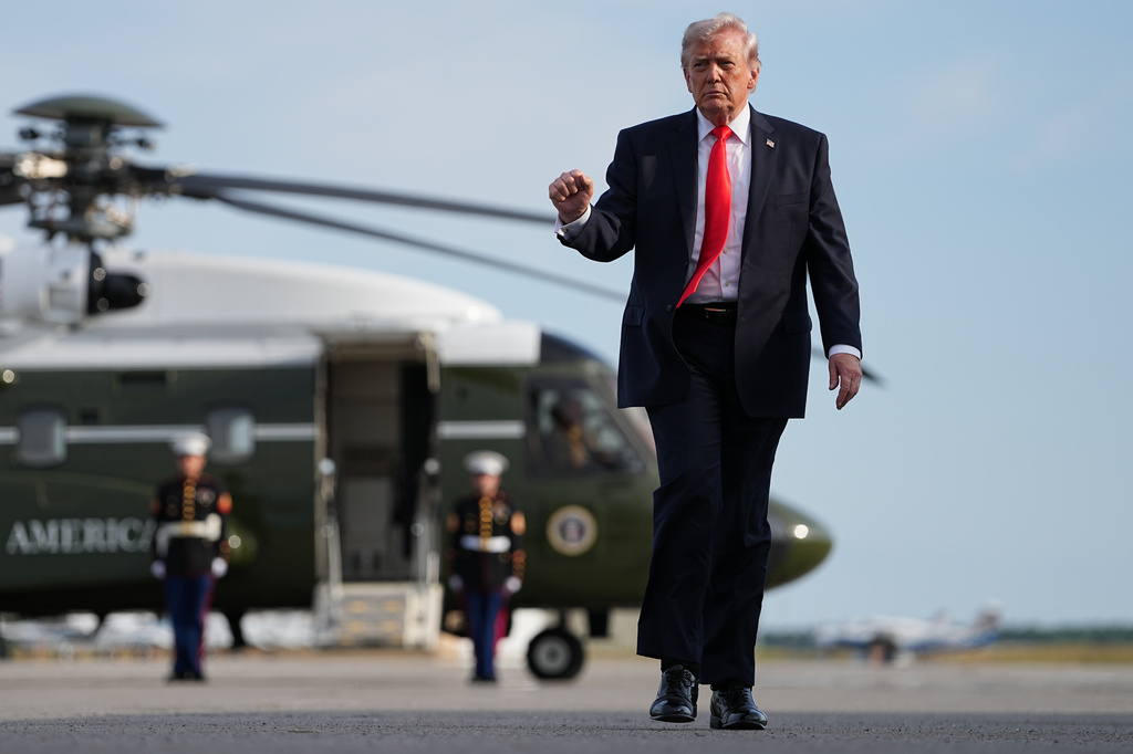 President Donald Trump walks from Marine One to board Air Force One at Ocala International Airport, in Ocala Fla., Friday, May 1, 2026.
