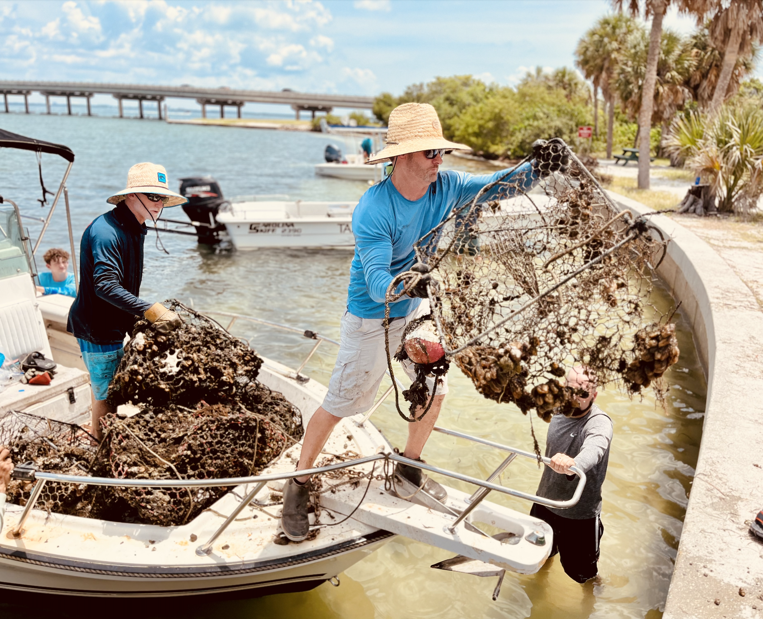 Volunteers clear ghost traps onto the Ft. DeSoto boat ramp. at Ft. DeSoto 