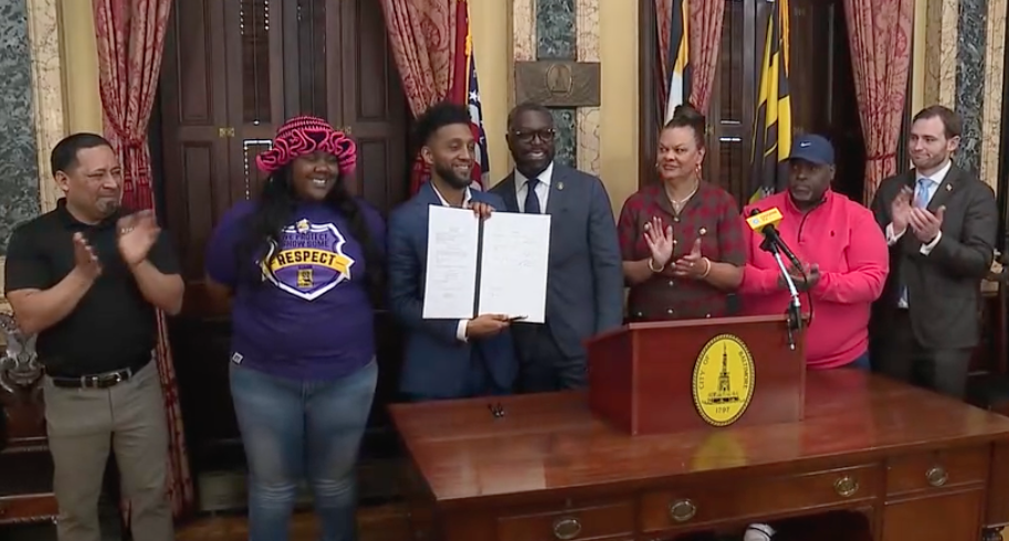 Mayor Scott security signing.png