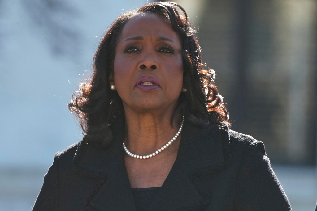 Federal Reserve Board of Governors member Lisa Cook leaves the Supreme Court in Washington, Wednesday, Jan. 21, 2026. 