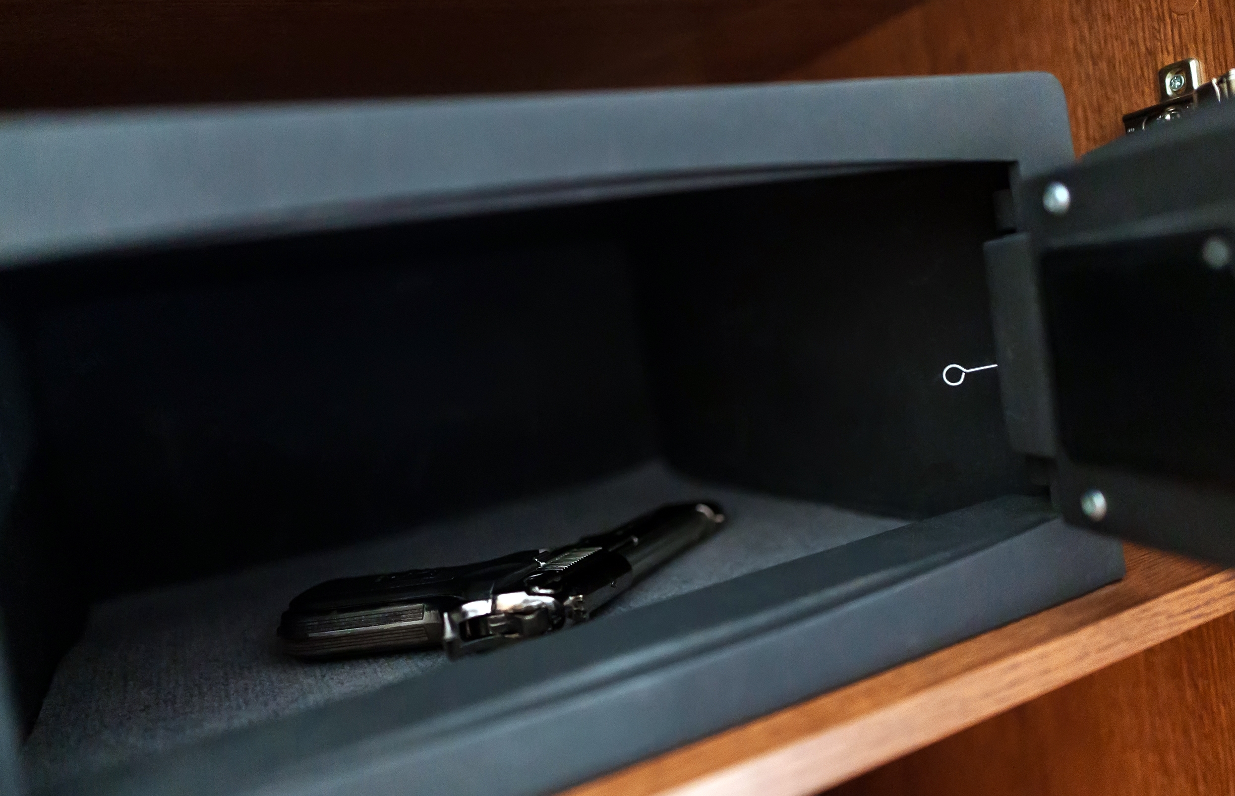Gun in metal safe.