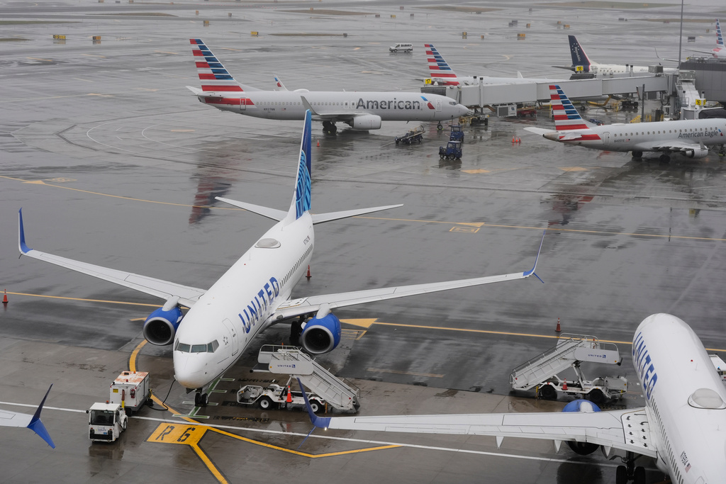 File photo of various planes sitting on the tarmac at LaGuardia Airport in New York, Monday, March 23, 2026.
