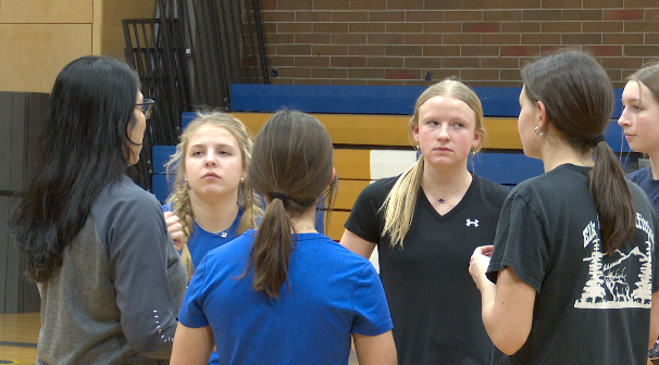 Thompson Falls Girls Basketball players huddled at practice, Thompson Falls