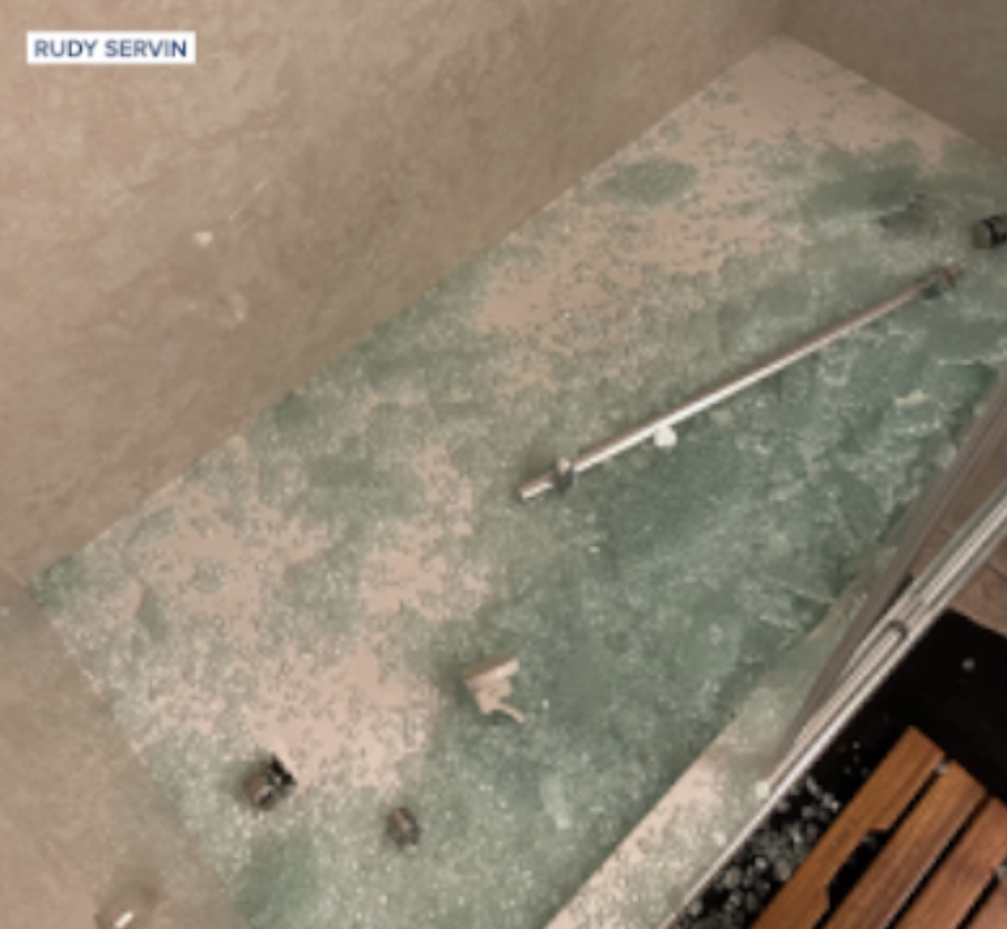 Exploding shower door