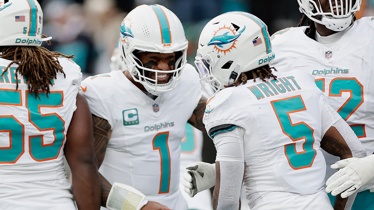 Miami Dolphins quarterback Tua Tagovailoa (1) reacts during the first quarter of an NFL football game against the New York Jets, Sunday, Dec. 7, 2025, in East Rutherford, N.J.