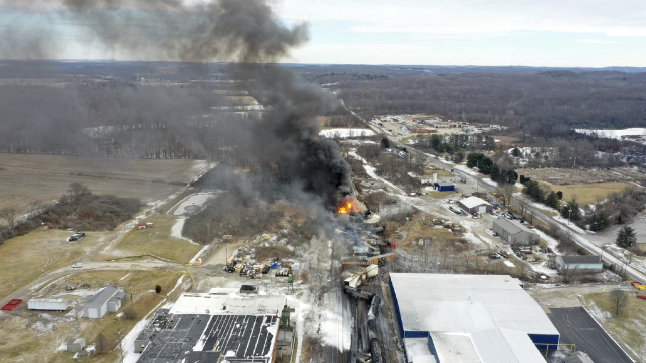 Portions of a Norfolk and Southern freight train that derailed on fire.