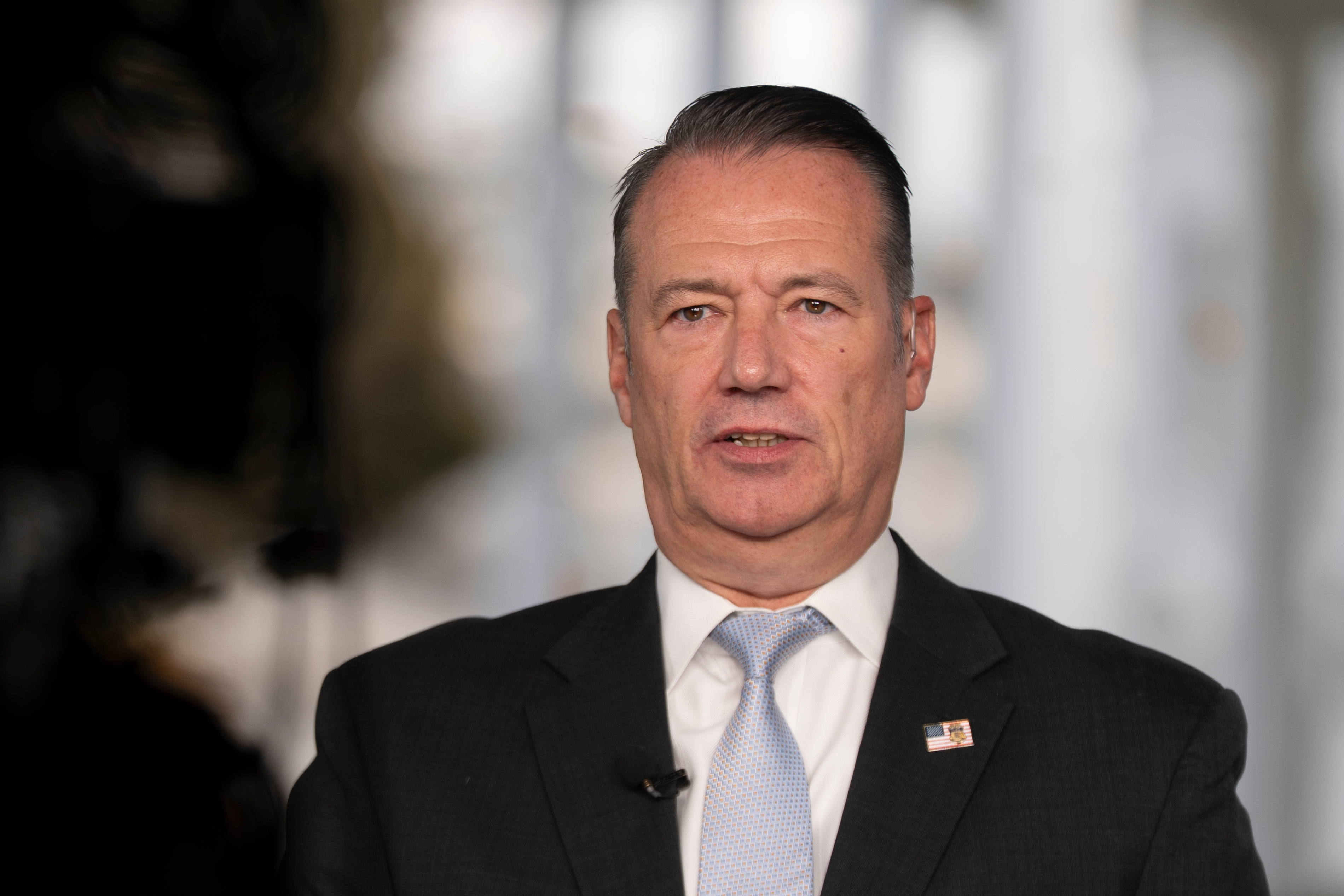 Todd Lyons, acting director of the U.S. Immigration and Customs. Enforcement (ICE), is interviewed on TV on the White House grounds, Monday, Nov. 3, 2025 in Washington. 