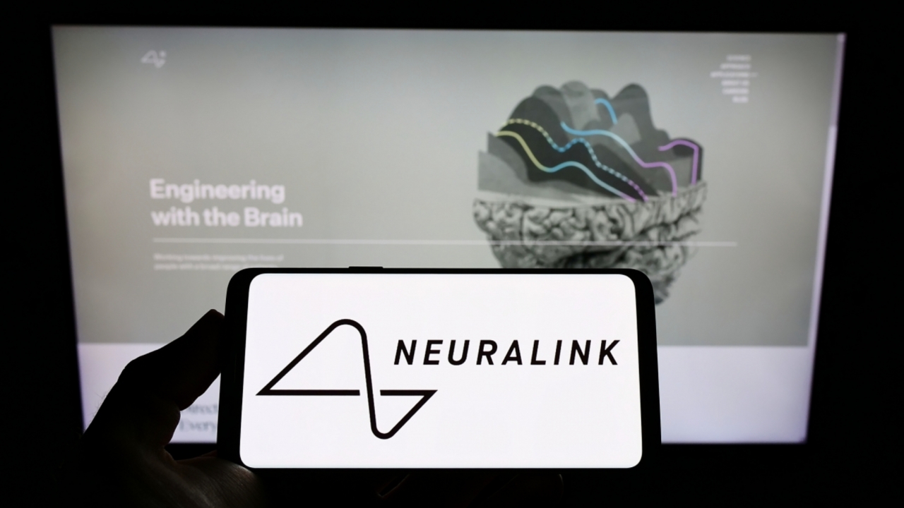The Neuralink logo on a smartphone.