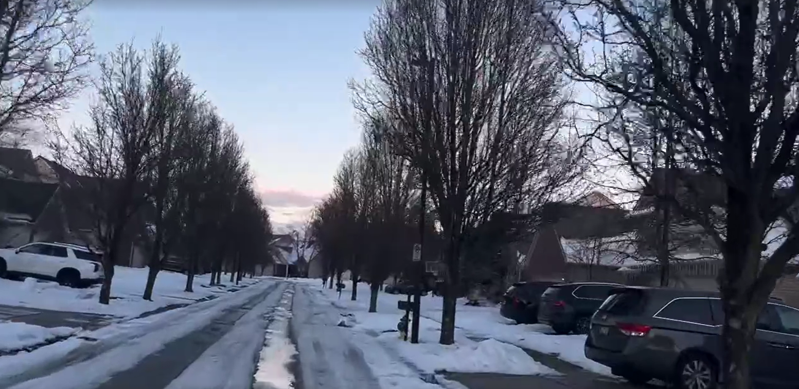 Neighborhood roads snow covered ahead of school week