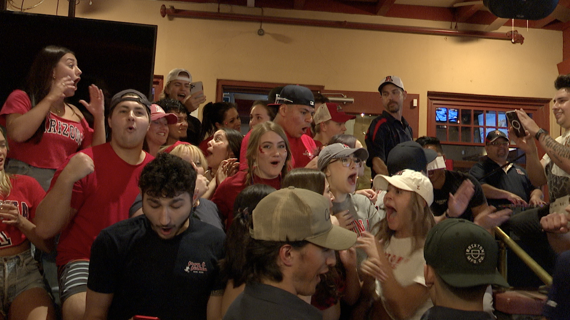 Frog and Firkin staff celebrate.png