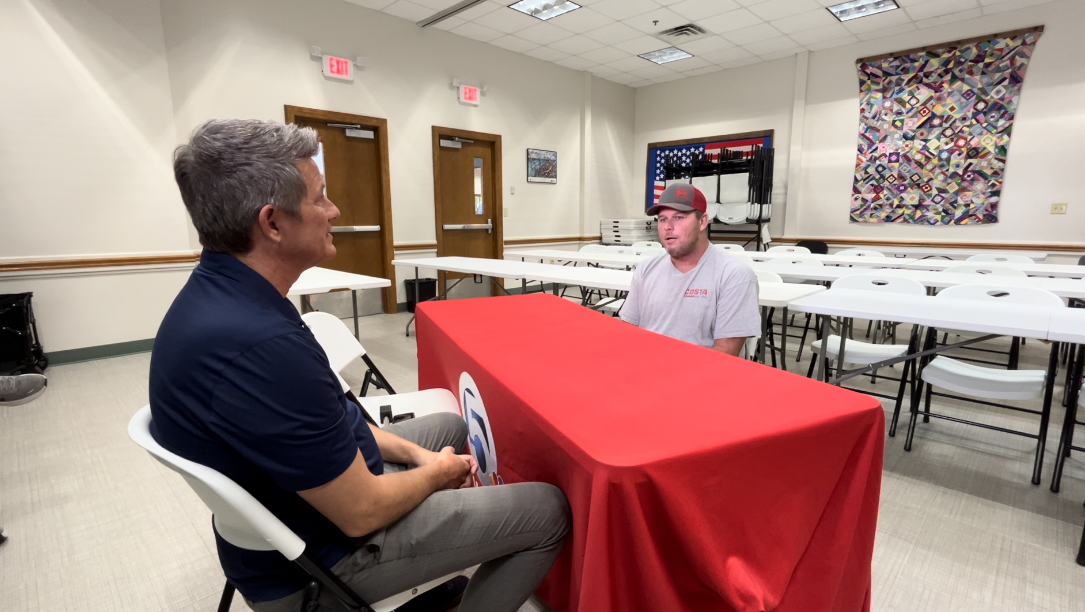 Army Veteran Gregg Maynard connects with WPTV Anchor Mike Trim at the Okeechobee Let's Hear It meetup