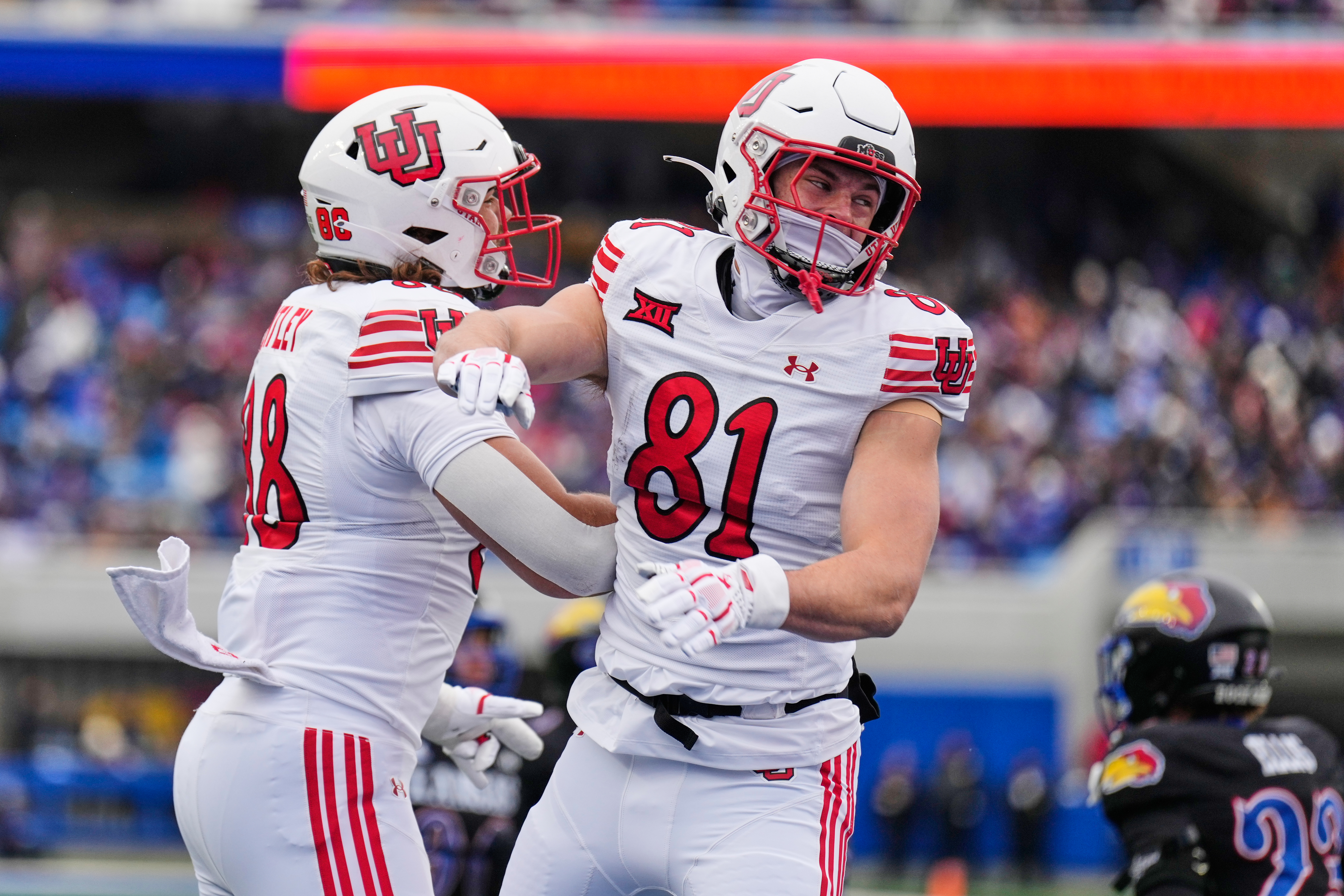 No. 14 Utah rallies to beat Kansas 31-21 and keep its slim Big 12 championship hopes alive