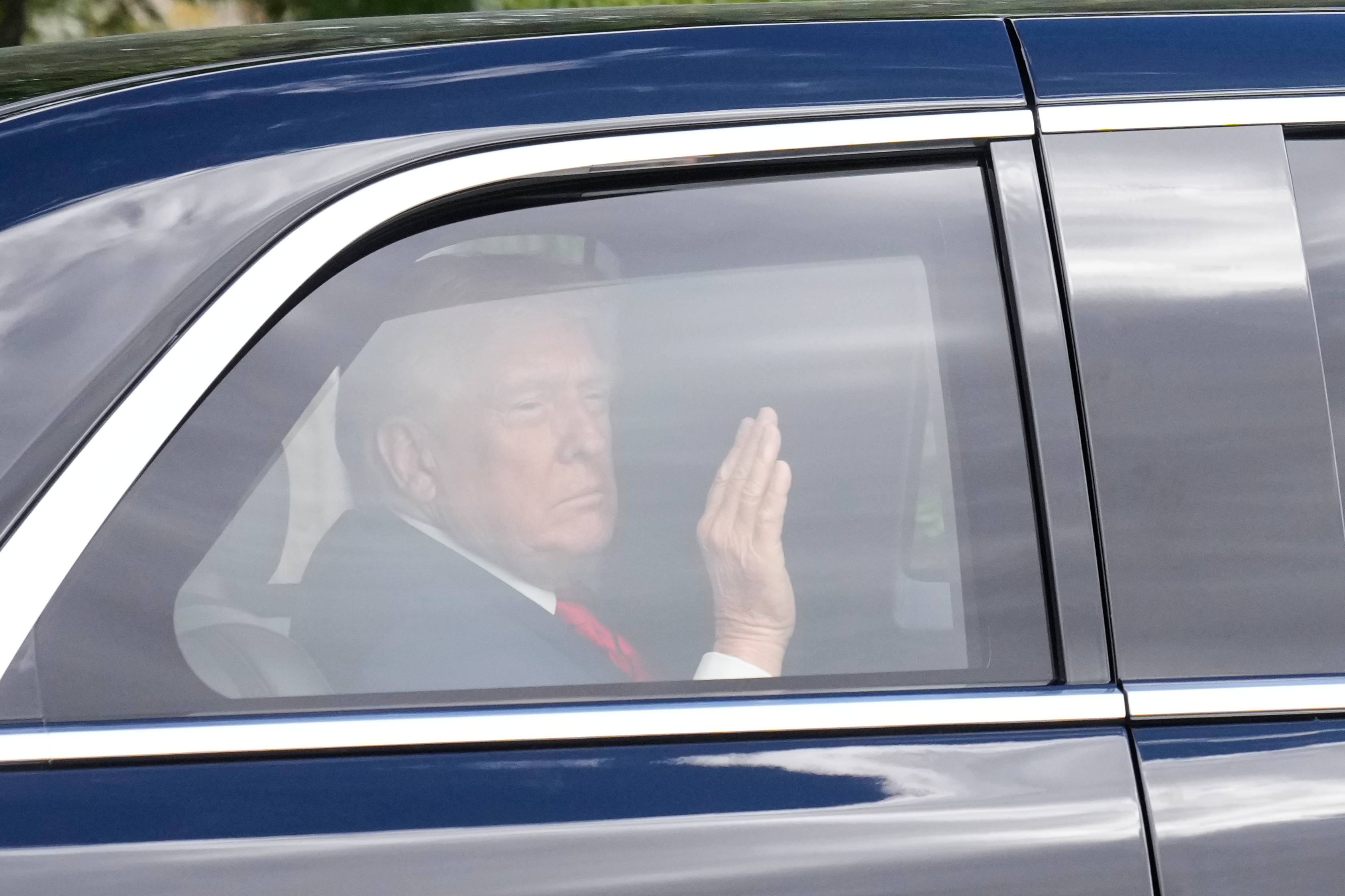 President Donald Trump departs Walter Reed National Military Medical Center in Bethesda, Md., Friday, Oct. 10, 2025.