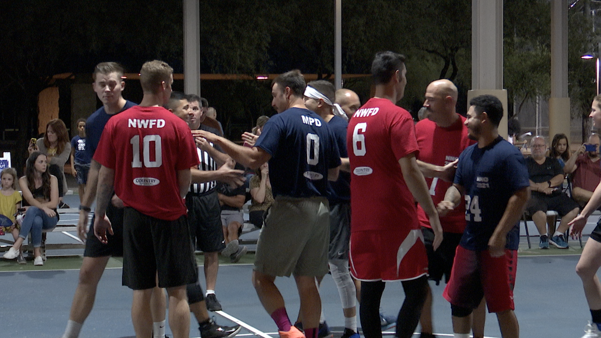 Marana police officers and firefighters get ready to tip off their annual basketball game after a one-year hiatus due to COVID-19.
