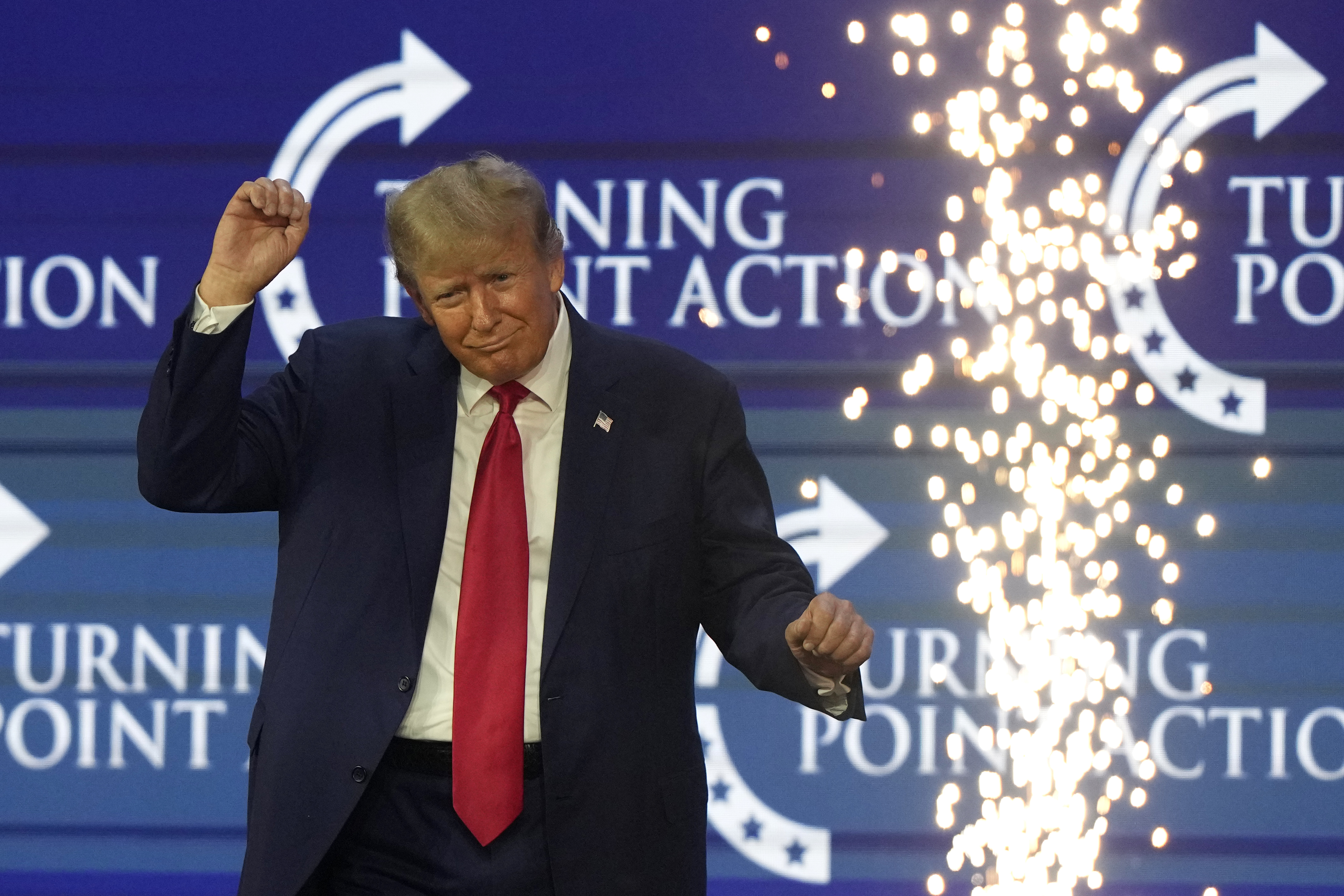 Former President Donald Trump dances on stage at the Turning Point Action conference Saturday in West Palm Beach. July 15, 2023