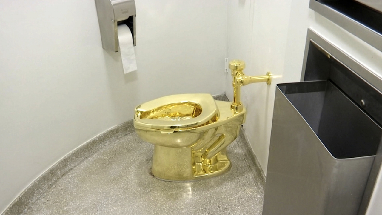 "America," an 18-karat gold toilet, is shown.