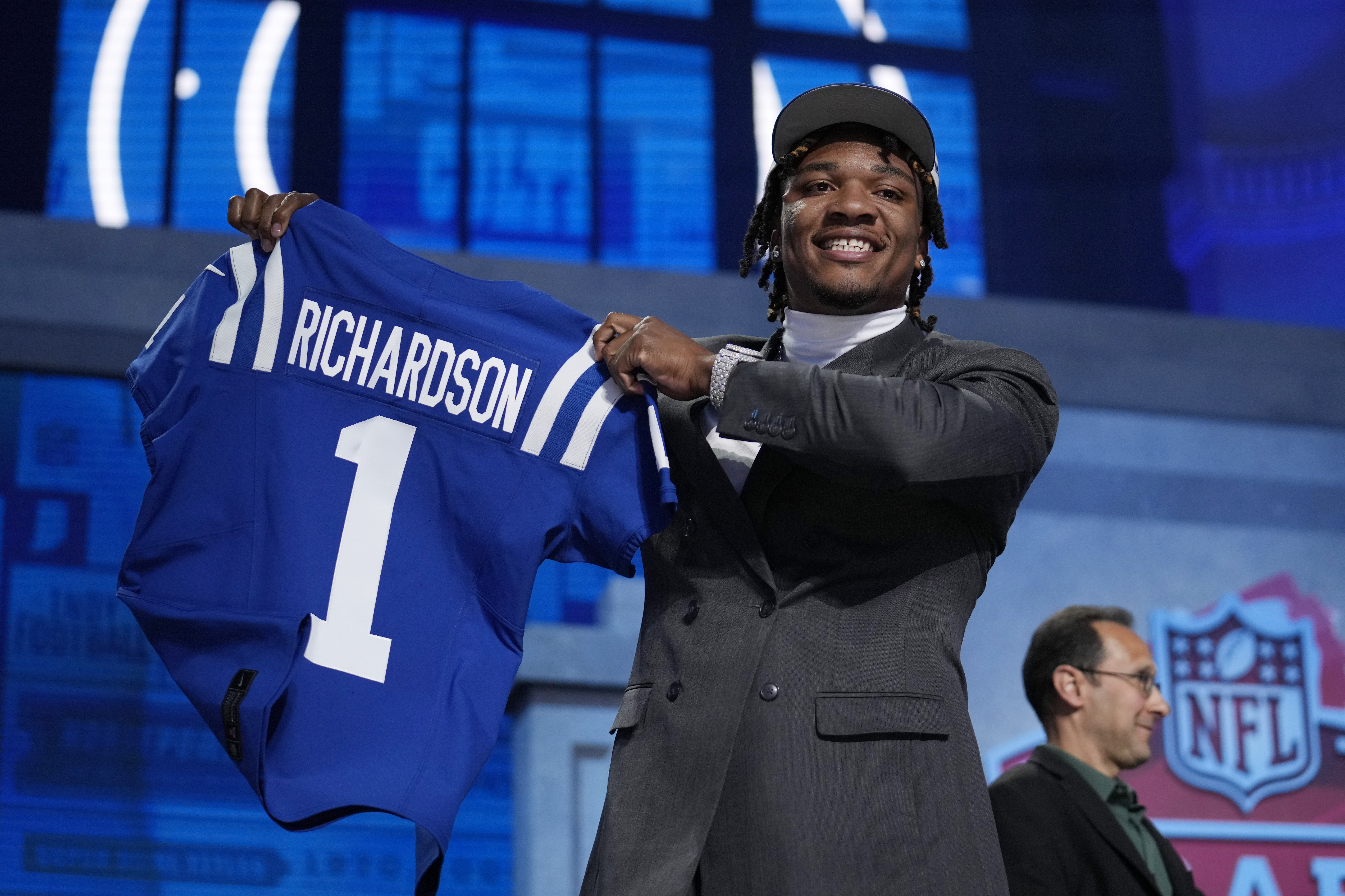 Florida Gators QB Anthony Richardson holds Indianapolis Colts jersey