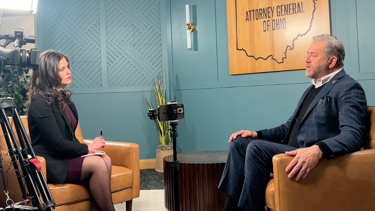 Reporter Morgan Trau and Attorney General Dave Yost