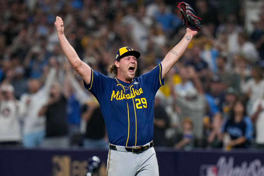 Milwaukee Brewers pitcher Trevor Megill celebrates after winning baseball's World Series, against the Tampa Bay Rays, Wednesday, Oct. 28, 2026, in St. Petersburg, Fla.