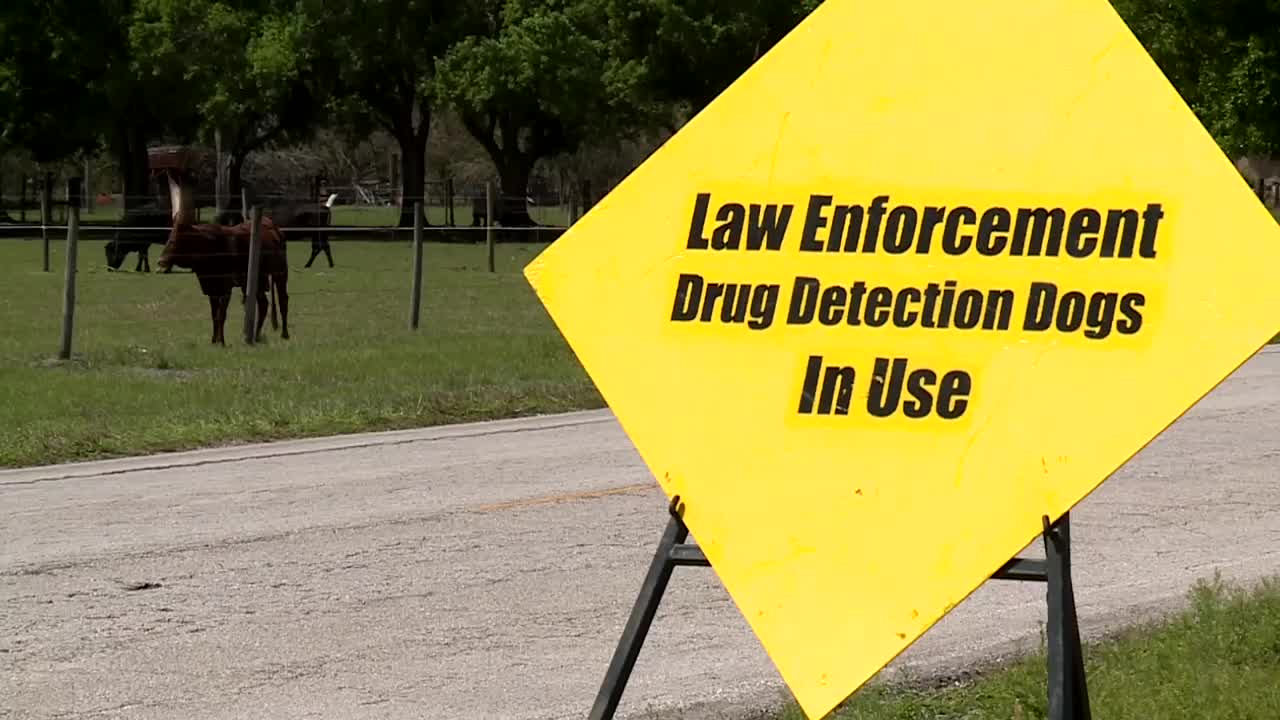 law enforcement drug detection dogs in use sign Okeechobee Music Arts Festival.jpg