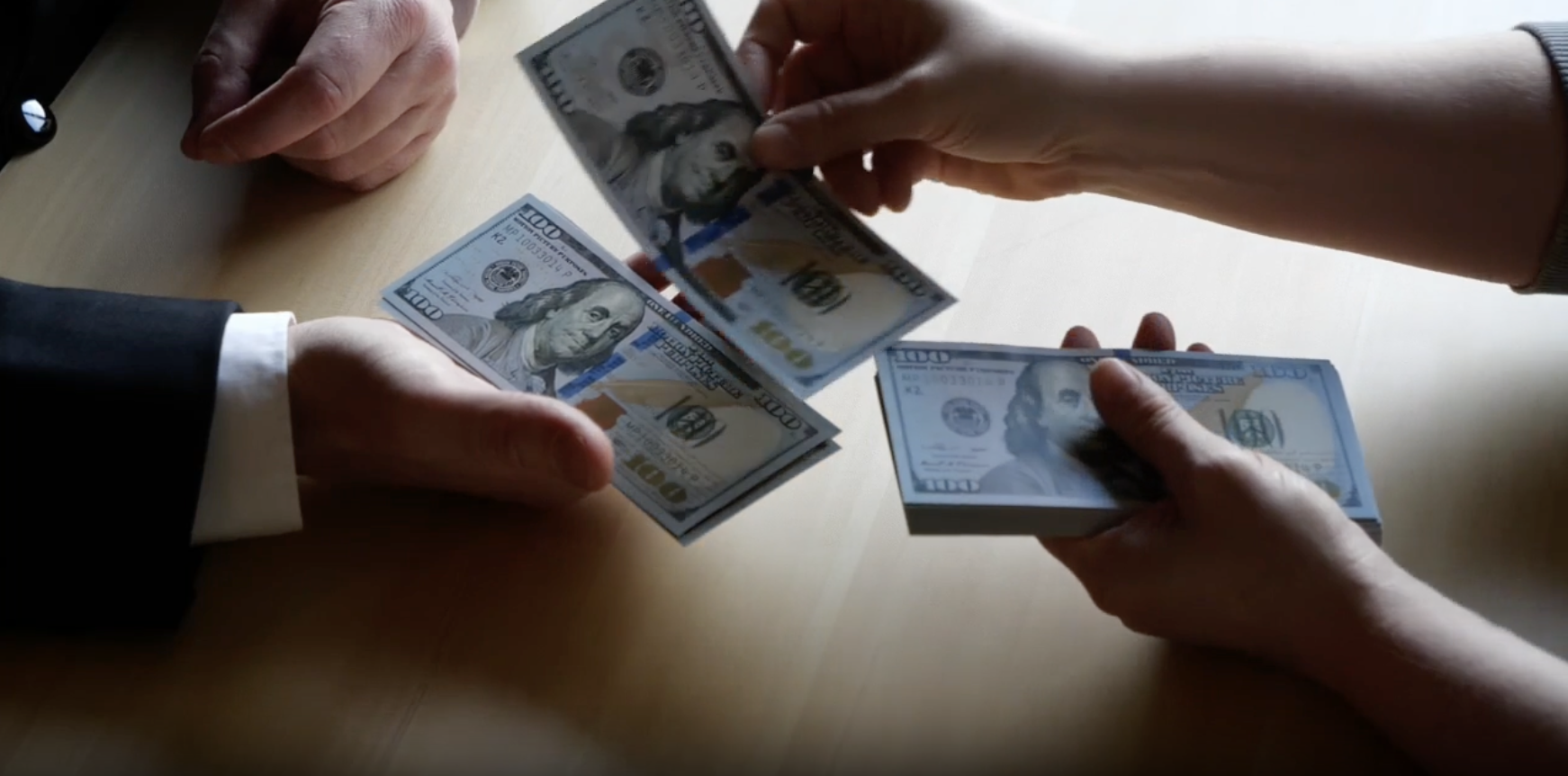Money exchanging hands