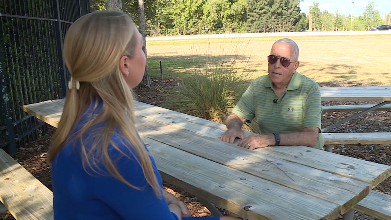 WPTV morning anchor Ashley Glass listens to Stuart resident Bob Yago about his traffic concerns.